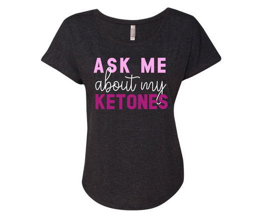 Ask me about my ketones shirt with bold text on black background.