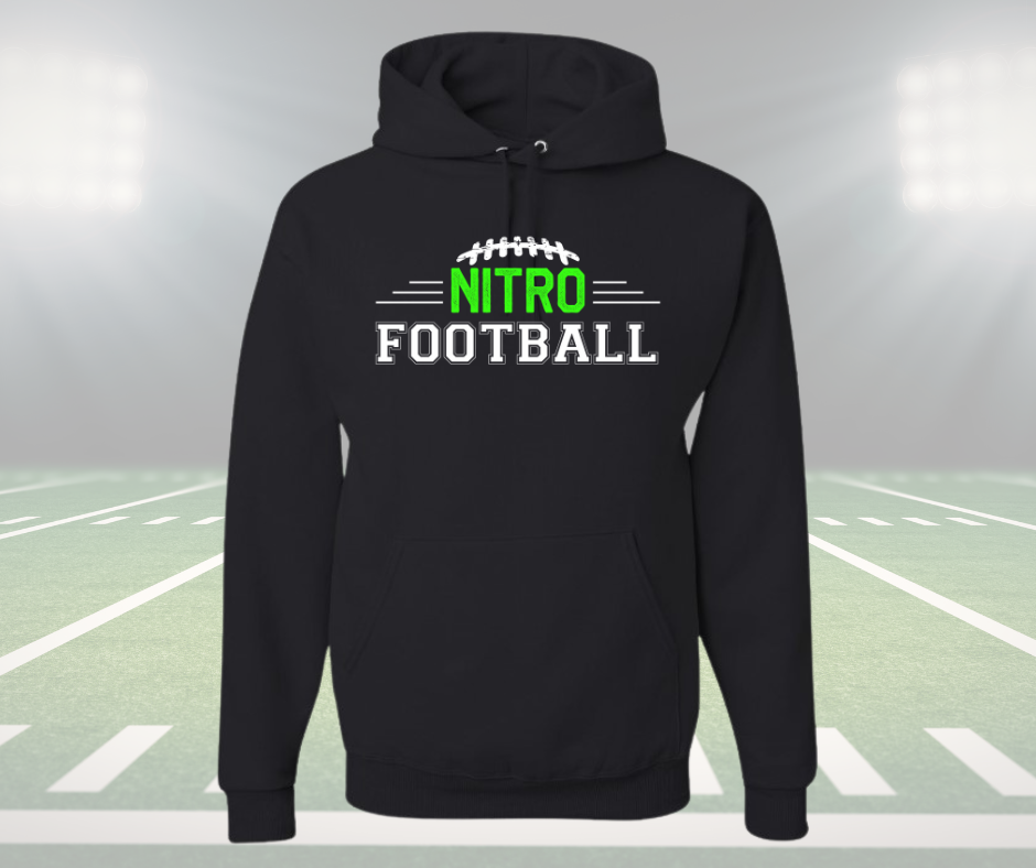 Black youth unisex Nitro Hoodie with football design on front, displayed on a football field background