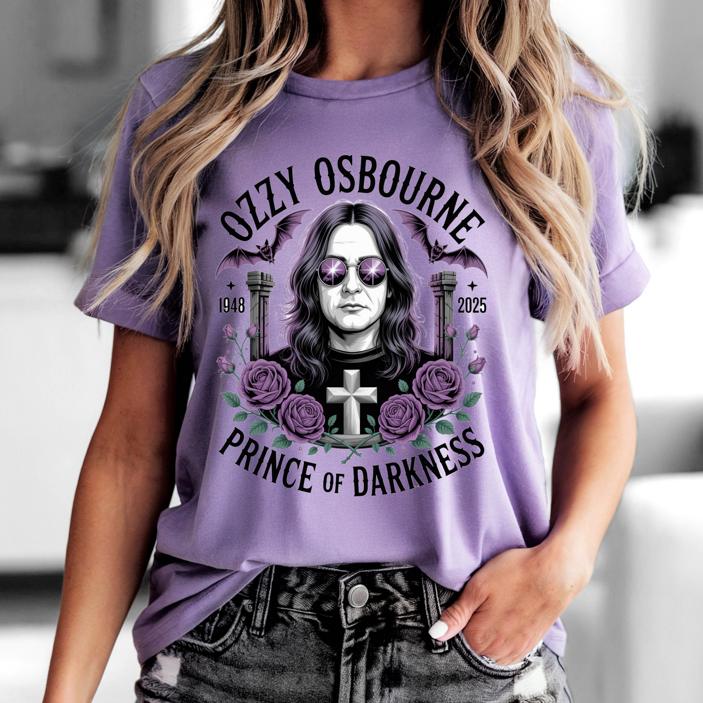 Woman wearing a purple Ozzy Osbourne Prince of Darkness shirt featuring a graphic of Ozzy with sunglasses, roses, and text design.