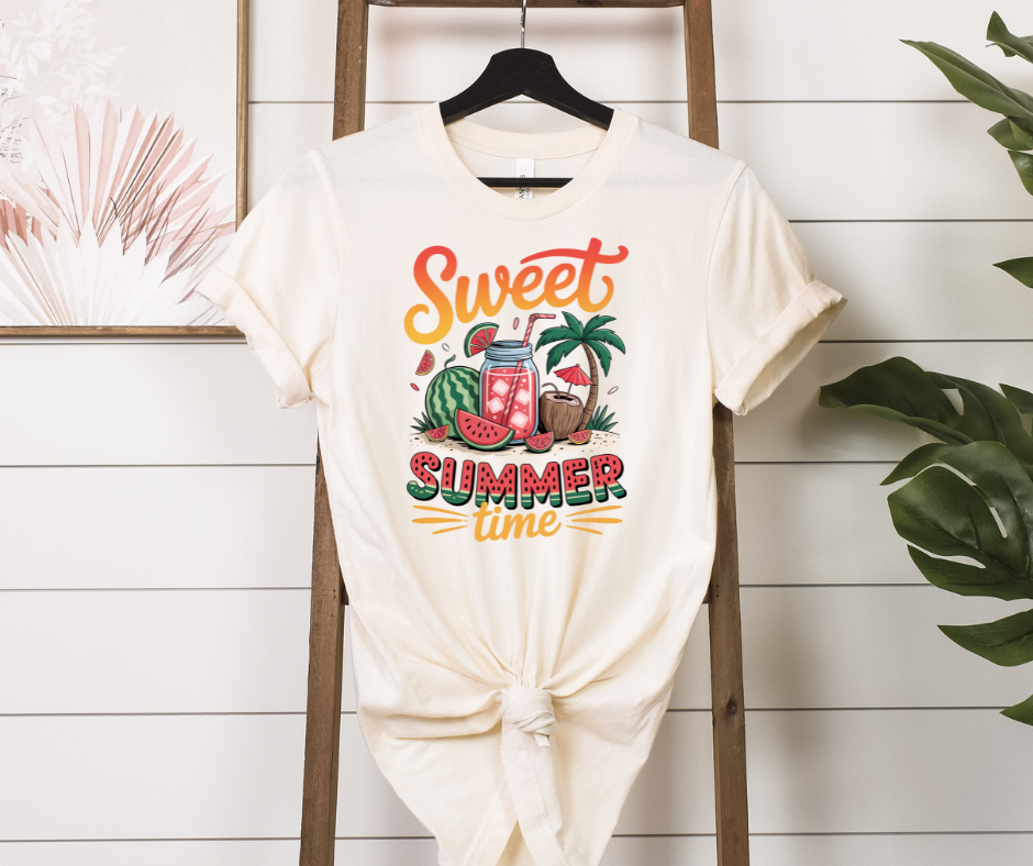 Sweet Summertime Shirt with vibrant watermelon-inspired design hanging on a wooden ladder.