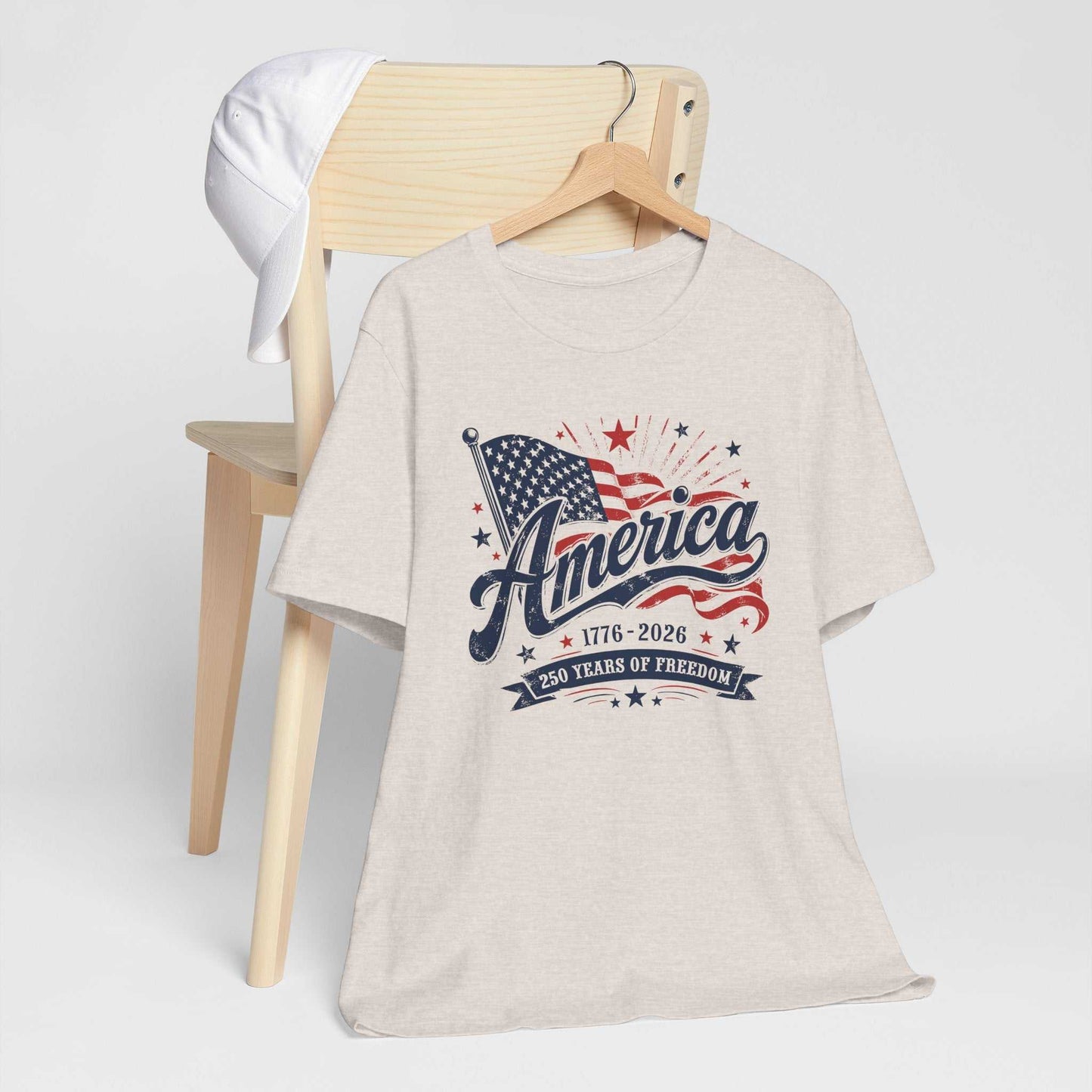 America 250 Years of Freedom patriotic tee with vintage American flag and 1776-2026 dates in red, white, and blue
