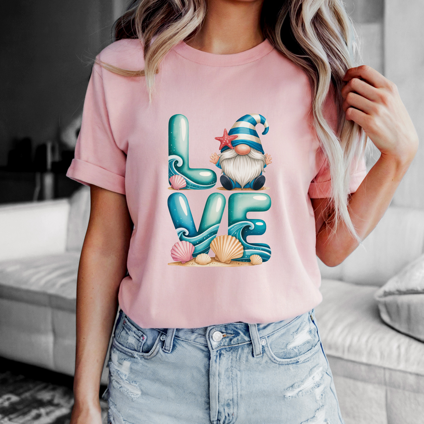 Love Beach Gnome Tee with whimsical design and pink color.