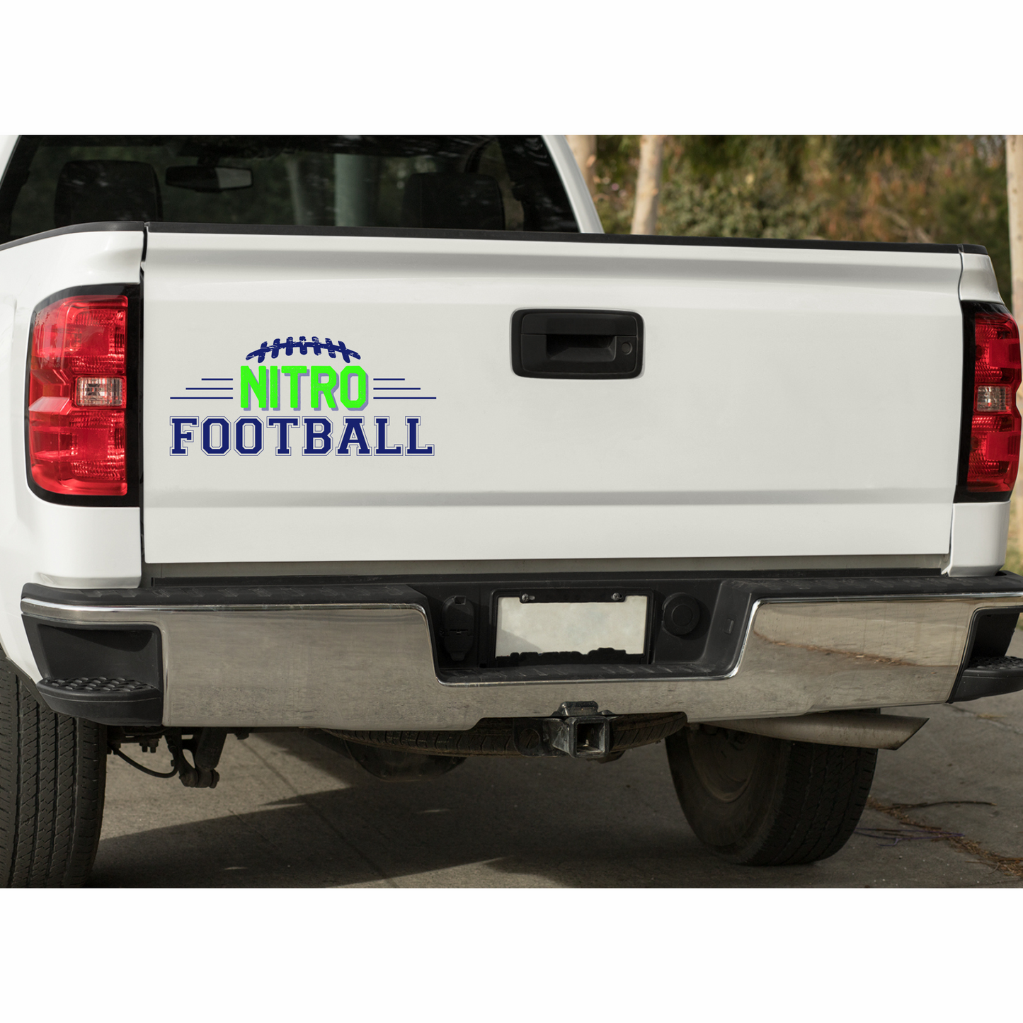 White truck tailgate with a vibrant Nitro Decals UV DTF football logo sticker featuring green and blue colors and a transparent background.