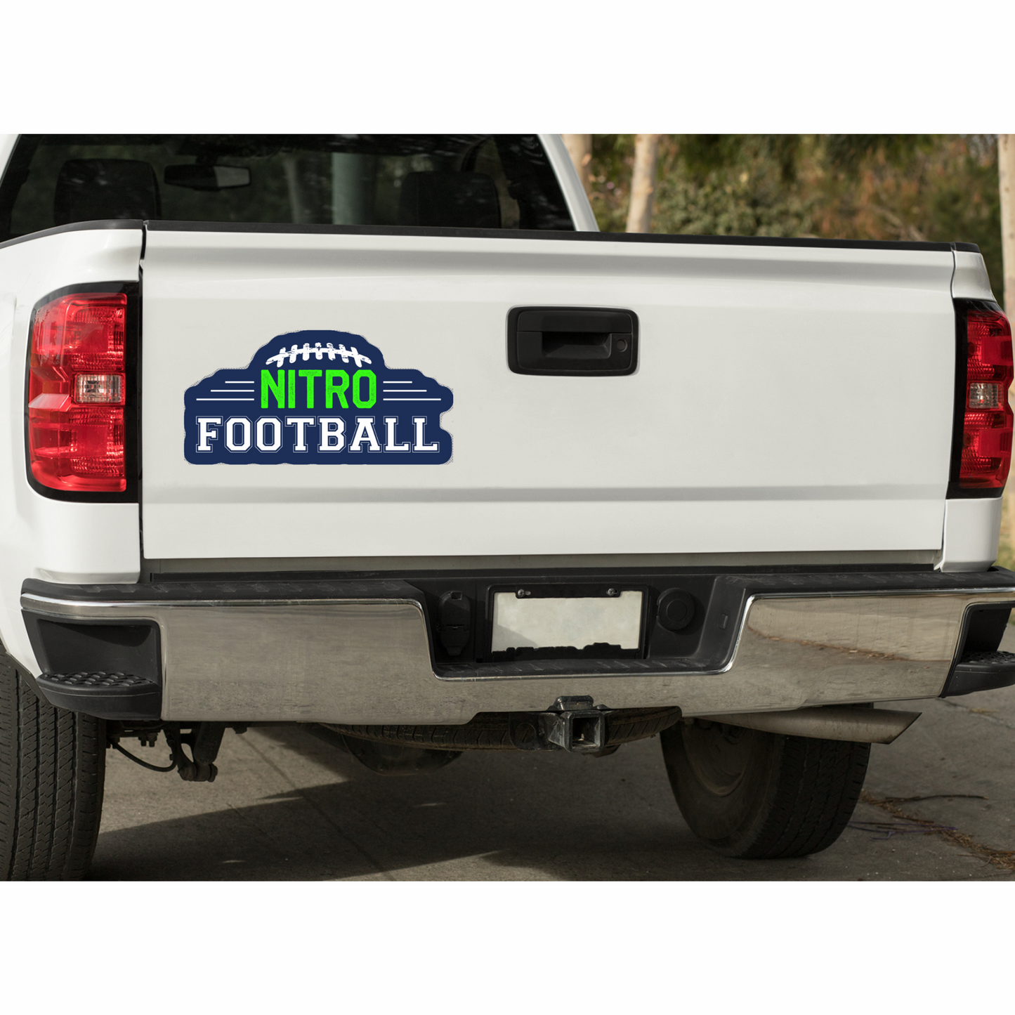 White truck tailgate with Nitro Decals die-cut football decal in blue and green, durable and customizable sticker