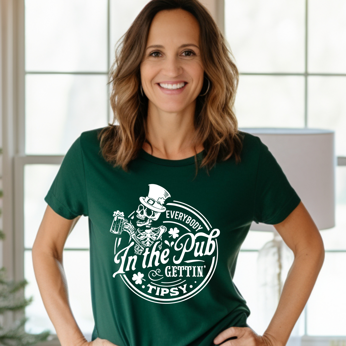 Tipsy Shirt with playful design worn by woman in casual setting.