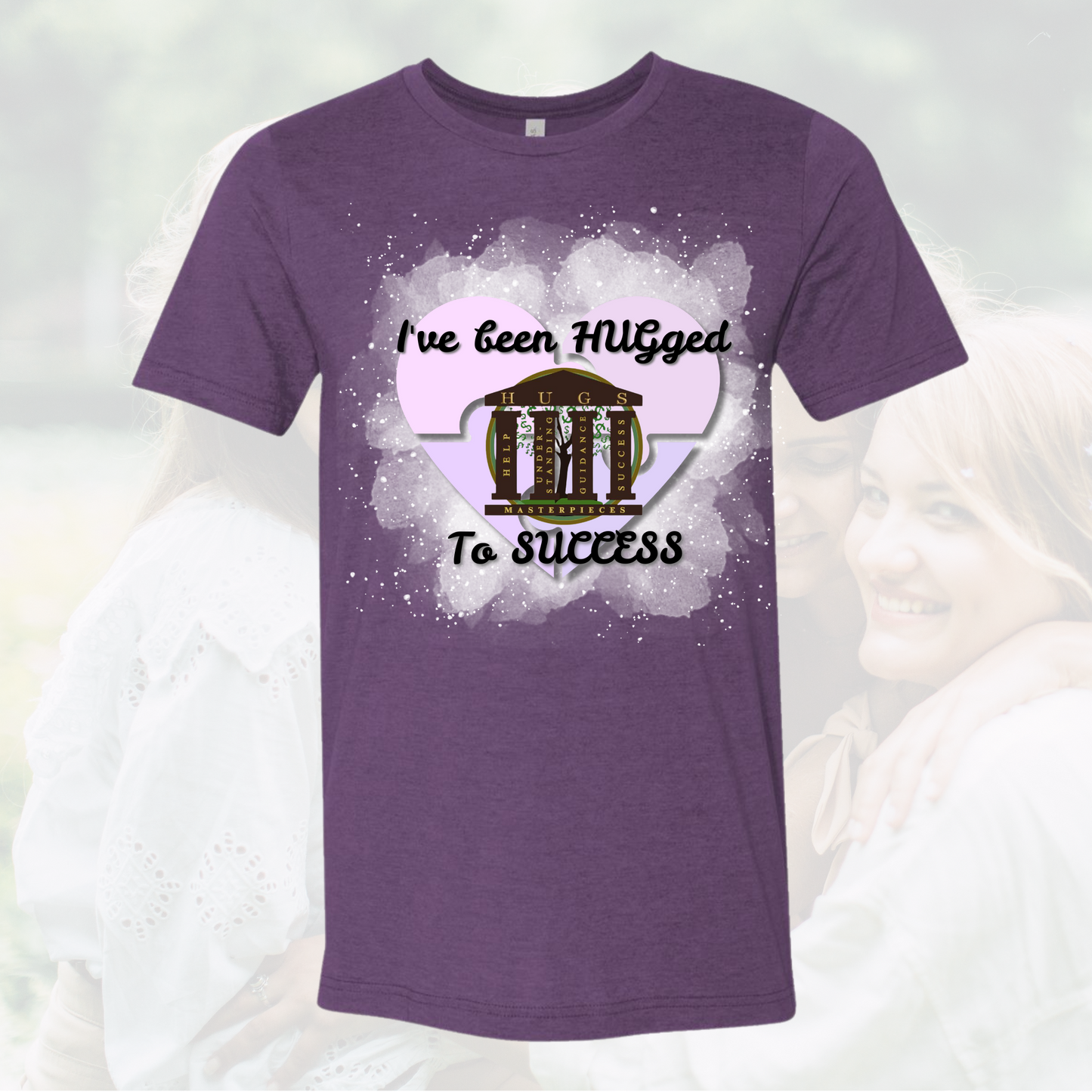 Purple crew neck tee with "I've Been Hugged to Success" motivational graphic and heart design