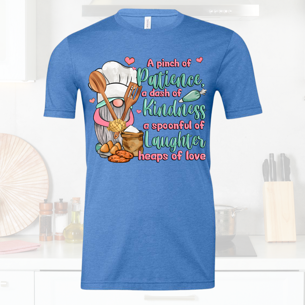 Kindness Cooking Gnome Shirt with whimsical design on blue tee.