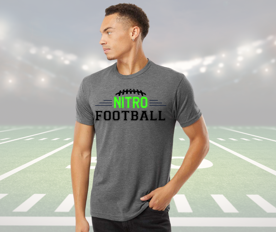 Adult unisex grey Nitro Shirt with football design worn on football field background
