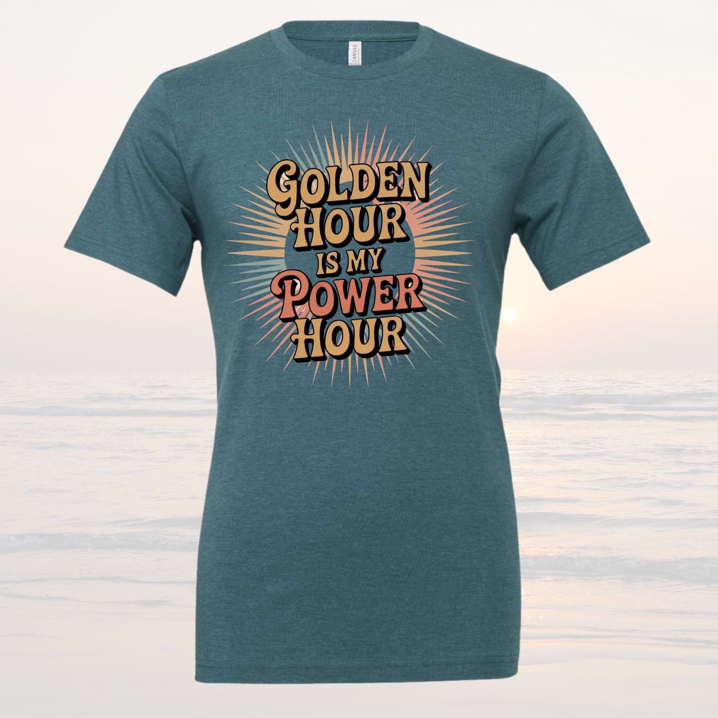 Blue loose-fit tee with "Golden Hour is My Power Hour" graphic from Sunsets & Salty Boots Collection.