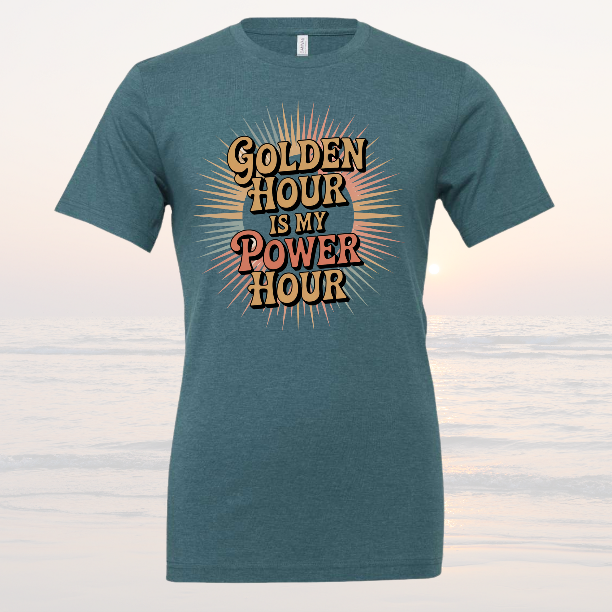 Blue loose-fit tee with "Golden Hour is My Power Hour" graphic from Sunsets & Salty Boots Collection.