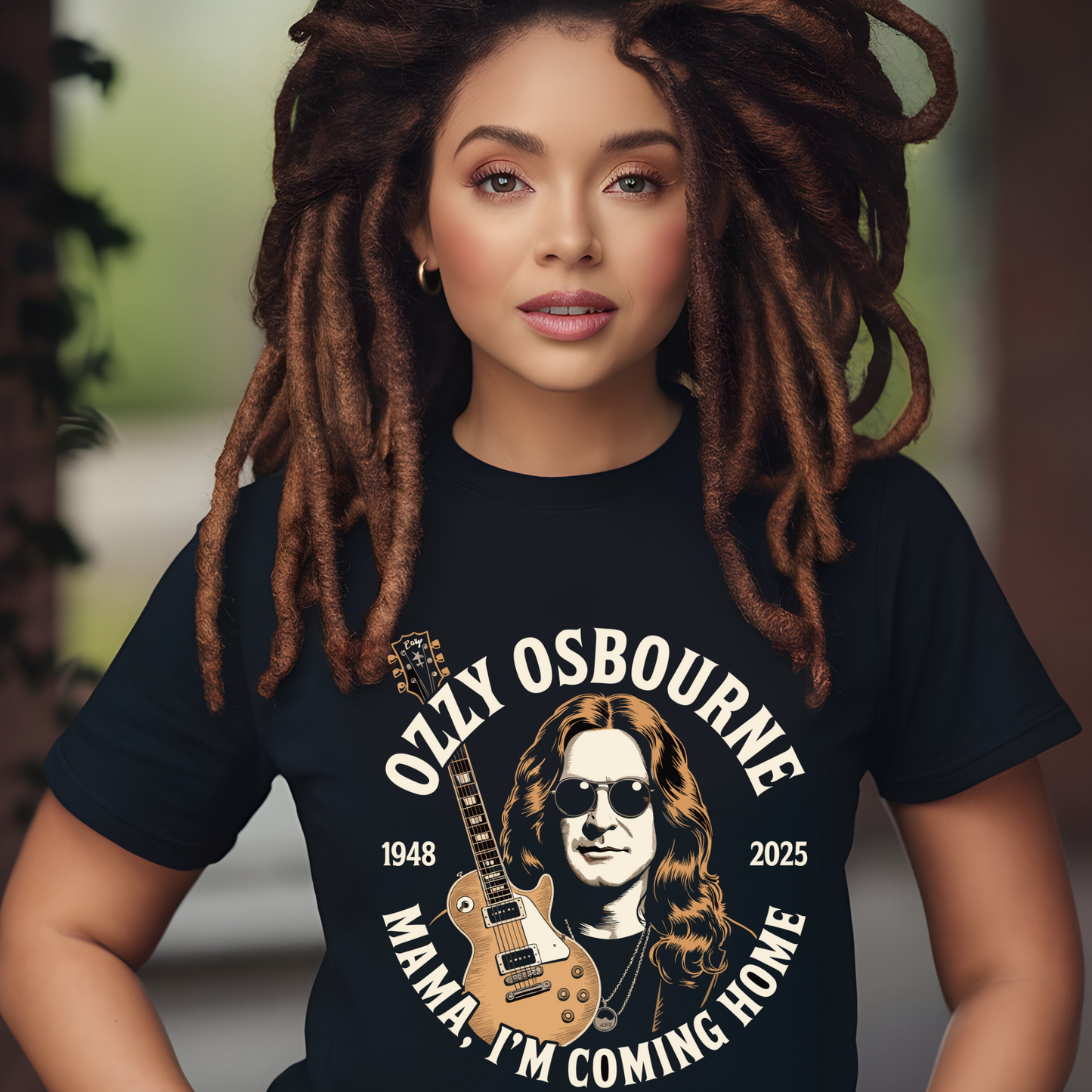 Woman wearing black "Mama, I'm Coming Home" Ozzy Osbourne shirt with guitar graphic and text design
