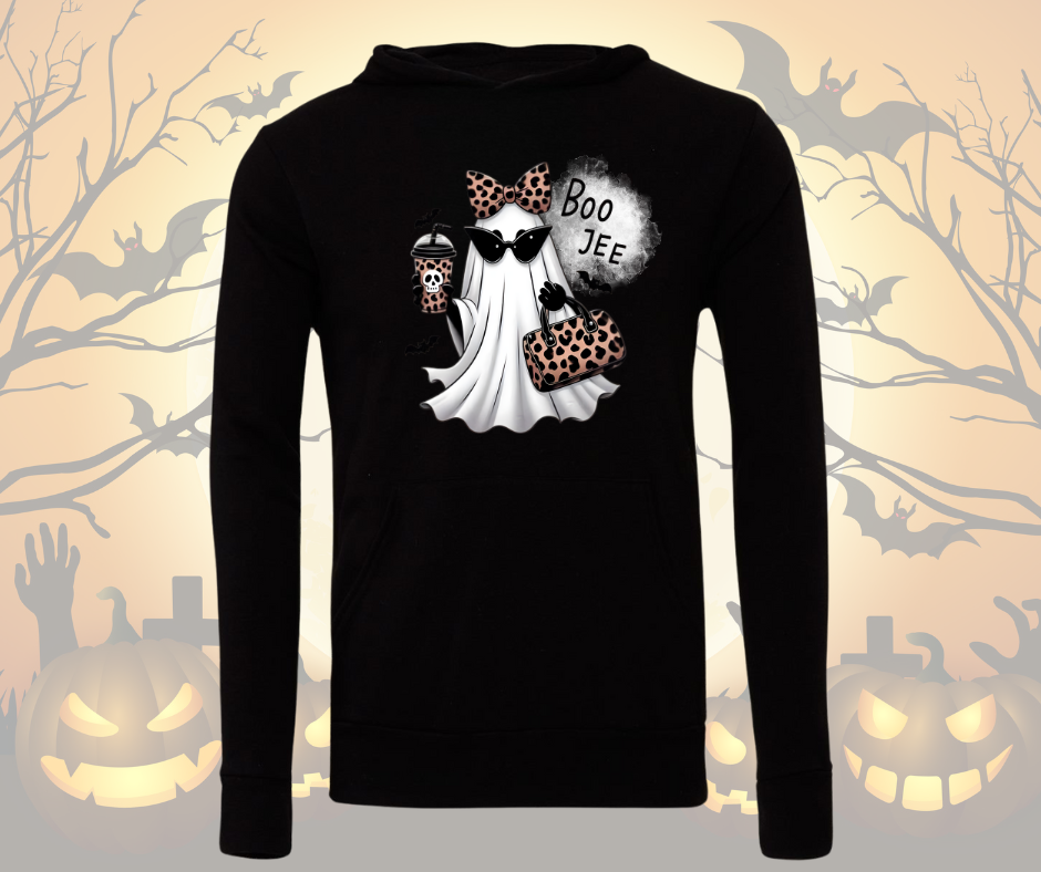 Black hoodie with Halloween-themed design on a festive background