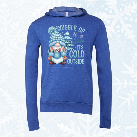 Royal blue hoodie featuring an adorable gnome design with "Snuggle up, it's cold outside" text, perfect for winter comfort.