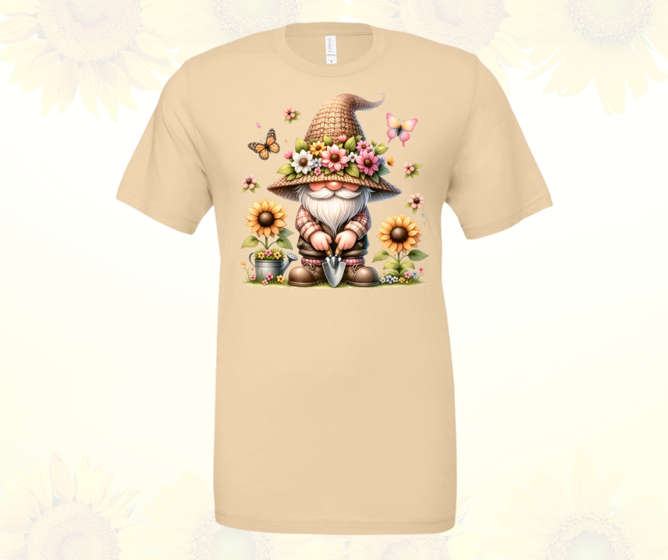 Gnome with Butterflies shirt in cream color featuring gnome and butterfly design, unisex crew neck.