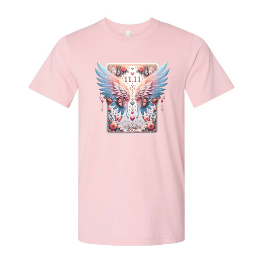 Pastel angel wings, butterflies, and the divine 11:11 design make this soft tee a dreamy reminder of love, guidance, and celestial magic