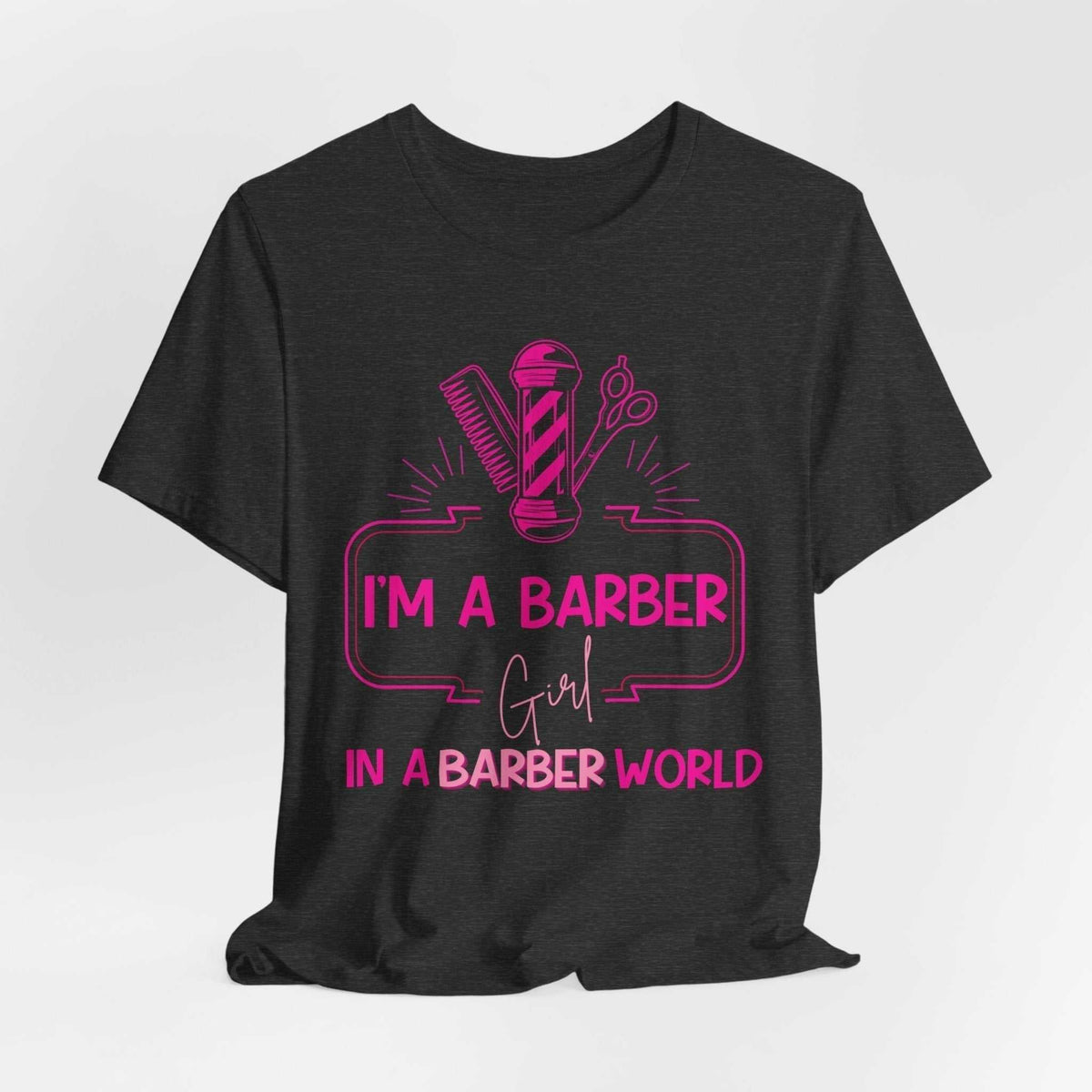 Barber Girl Tee in dark charcoal heather with bright pink barber pole, comb, scissors and slogan graphic
