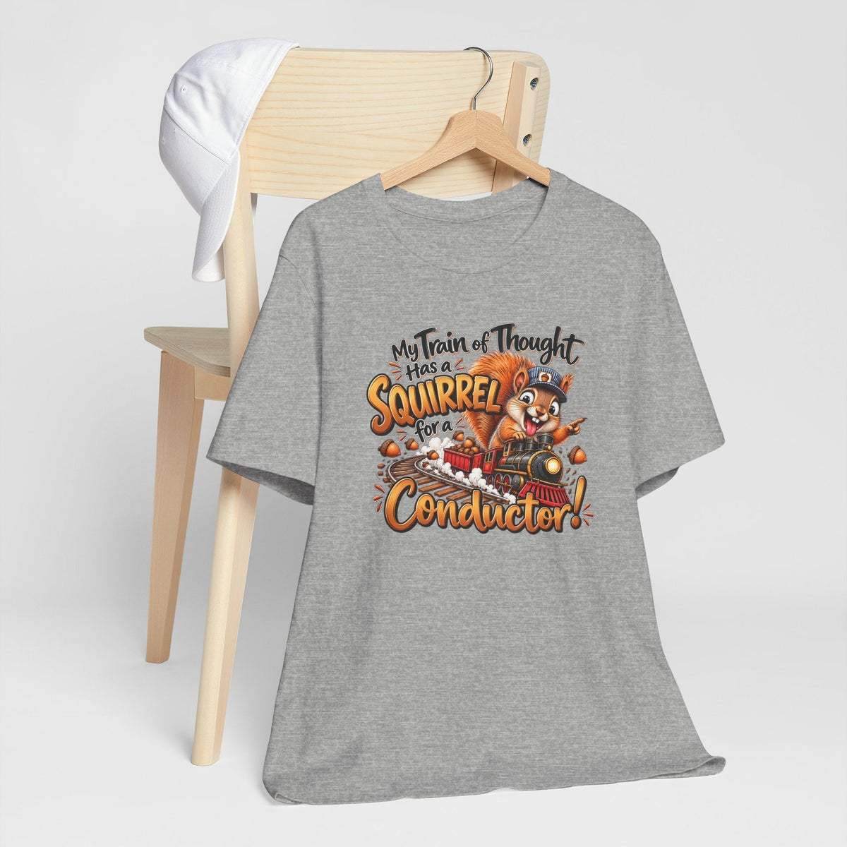 Funny animal shirt in heather gray with colorful squirrel conductor and train of thought graphic across the front