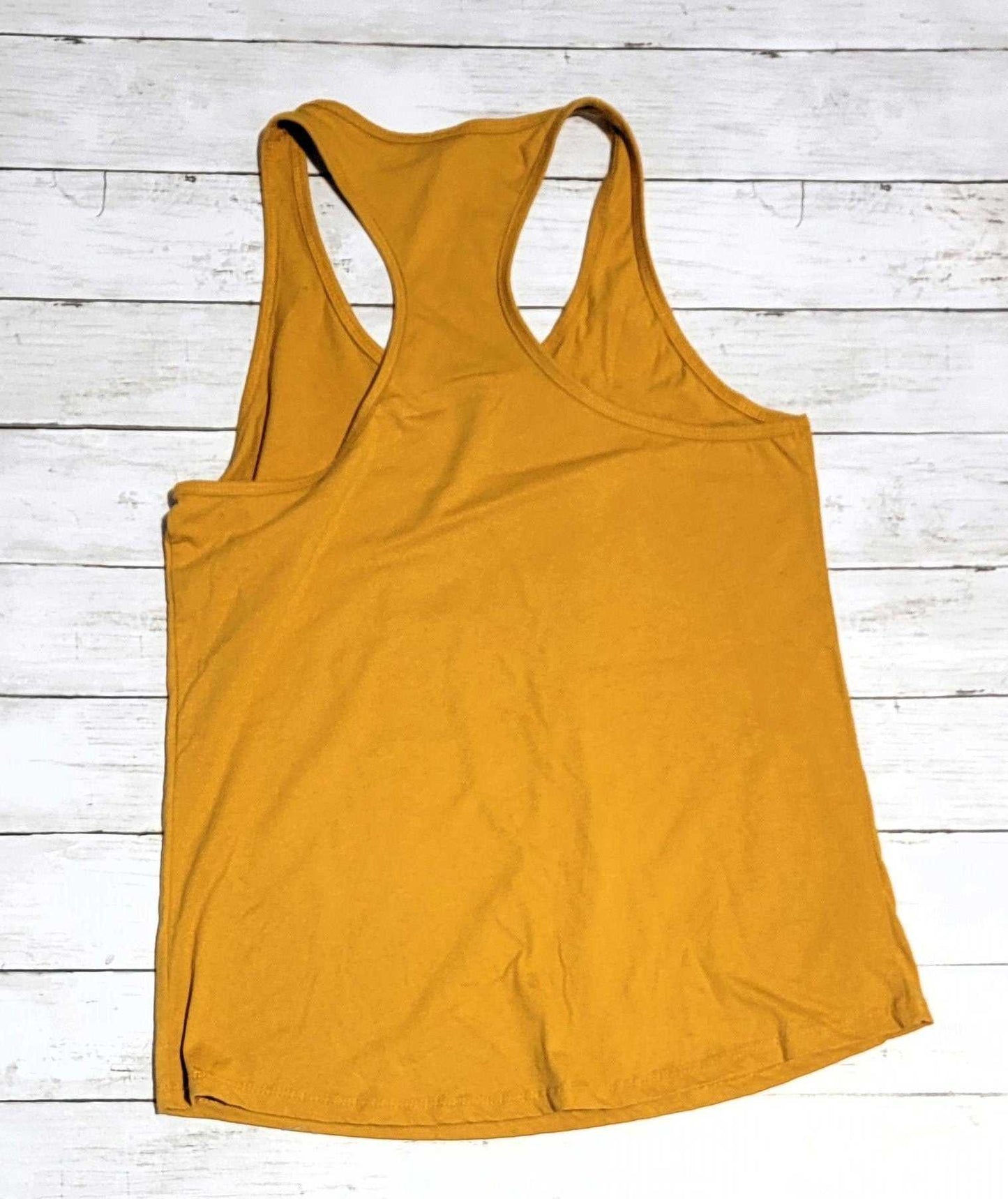 Gold-colored women's tank top, Cowboy Up Gnome design, durable DTF print.