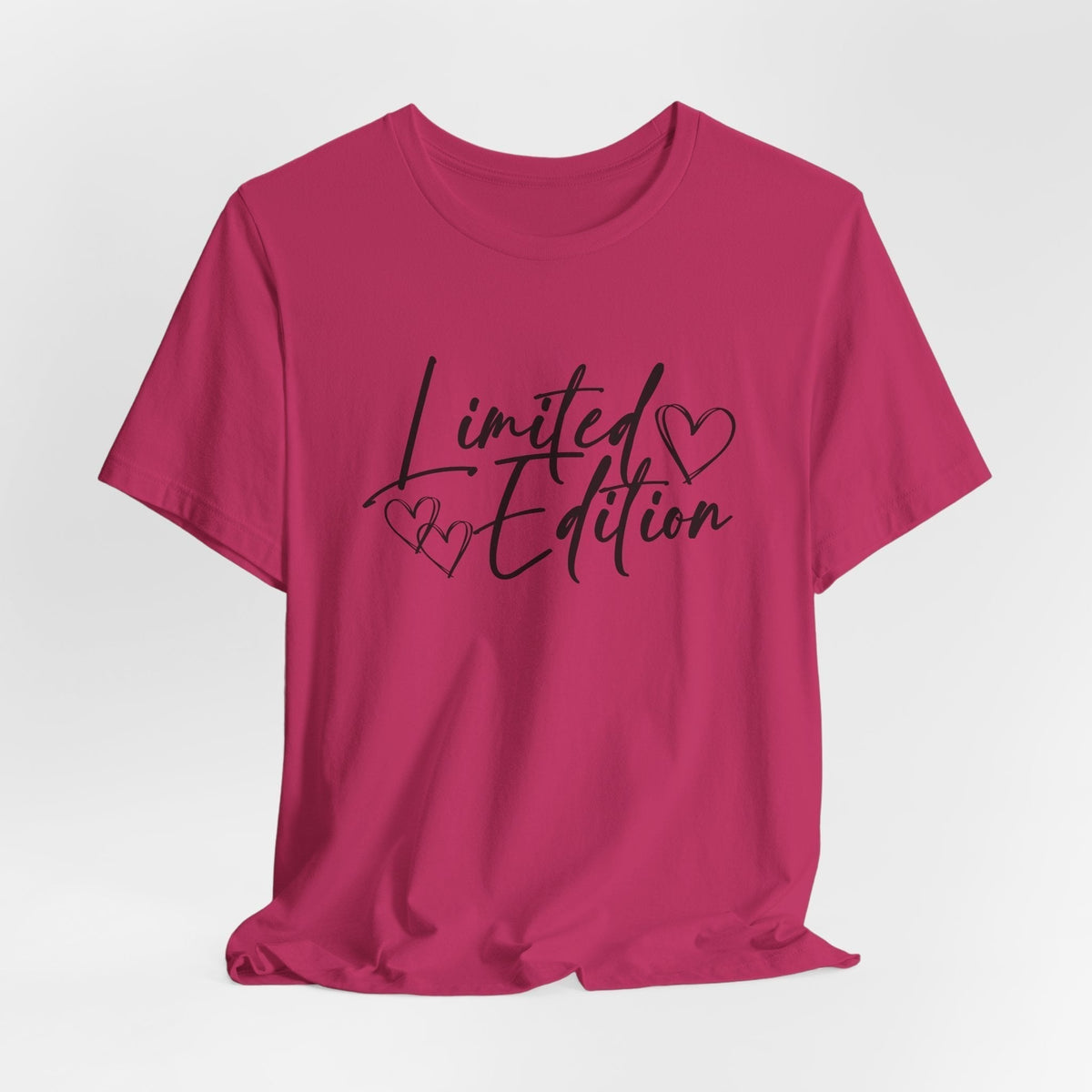 Motivational graphic tee in bright pink cotton with black “Limited Edition” script and heart details