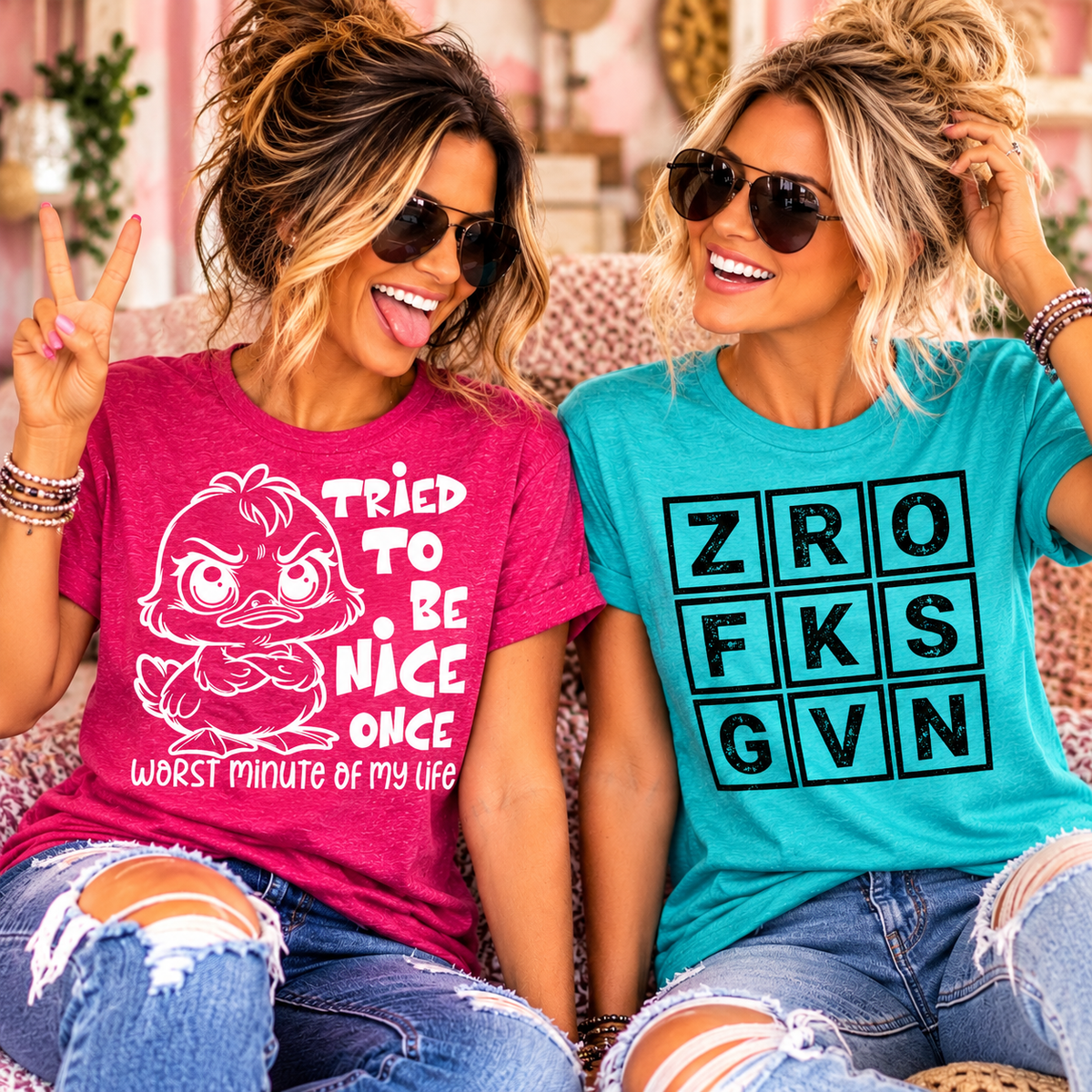 Two women modeling funny shirts for women, featuring a raspberry Tried to Be Nice Once graphic tee and a turquoise Zero FKS Given tee from Wyoming Sunset Boutique.