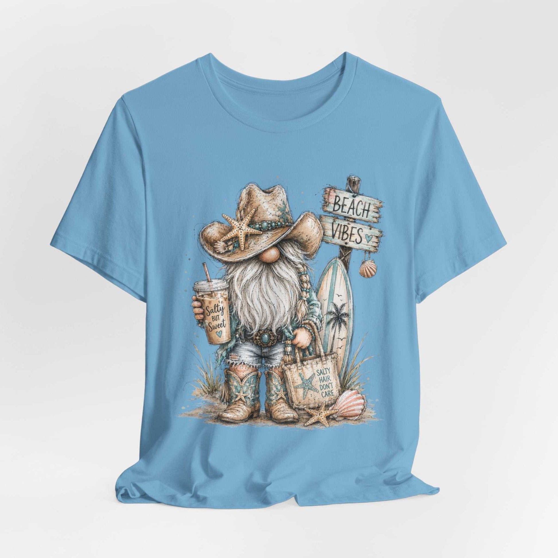Coastal Cowgirl Beach Gnome shirt with turquoise accents, cowboy boots, and seashells in watercolor style for summer beach and western vibes