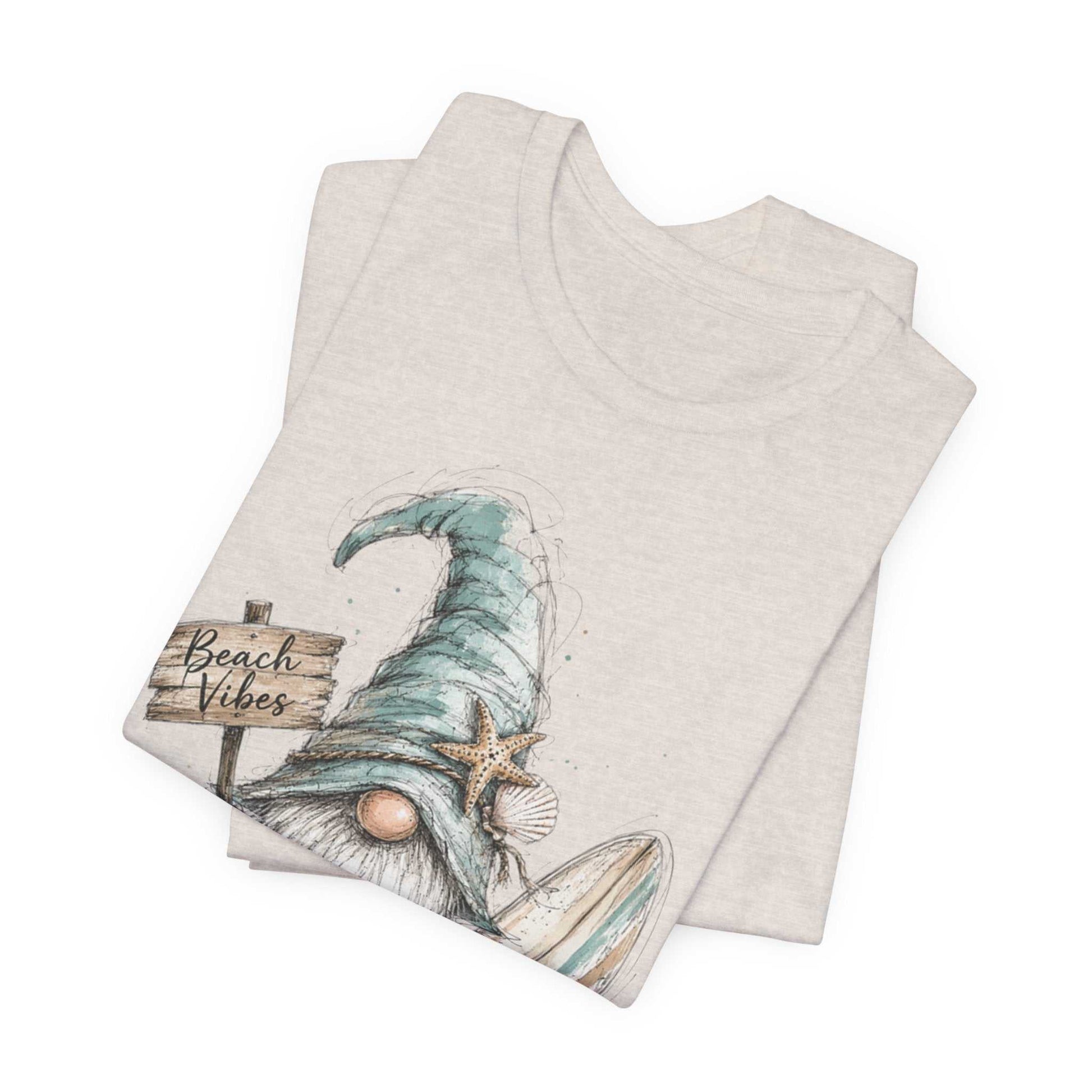 Beach Gnome Shirt with hand-drawn coastal gnome and seashells on a soft, lightweight tee ideal for beach and summer vibes