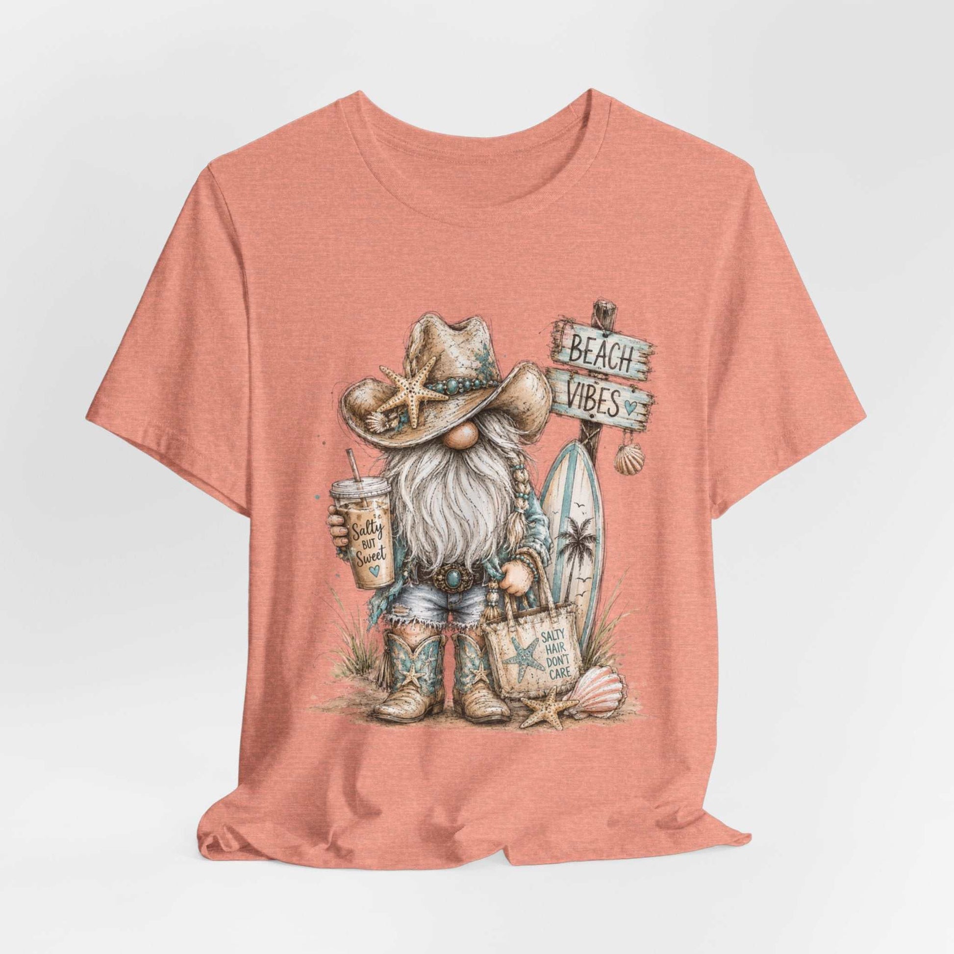 Coastal Cowgirl Beach Gnome tee with turquoise accents, cowboy boots, seashells, and watercolor sketch style for summer beach and western vibes