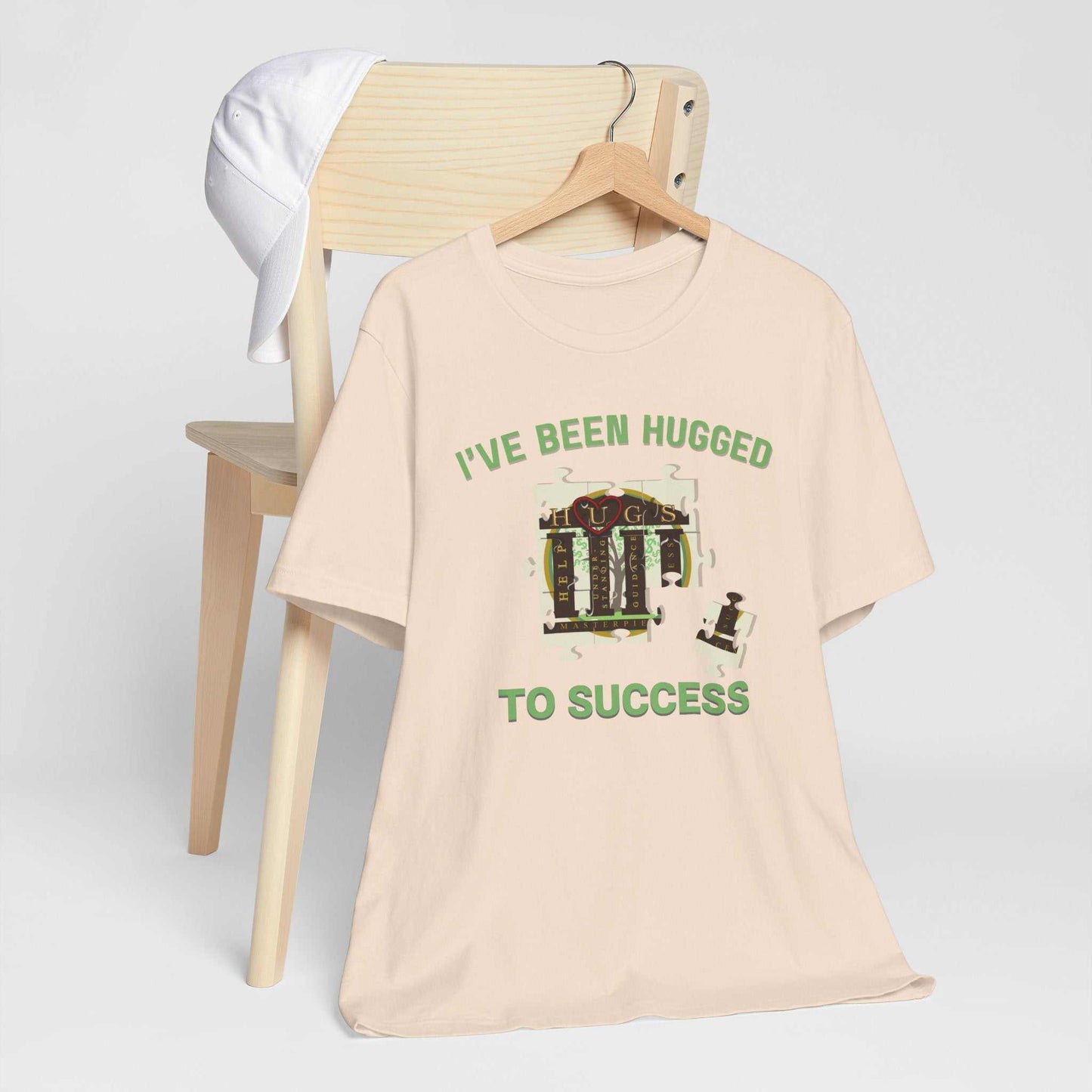 I've Been Hugged to Success vintage mech illustration t-shirt in natural color with muted green text