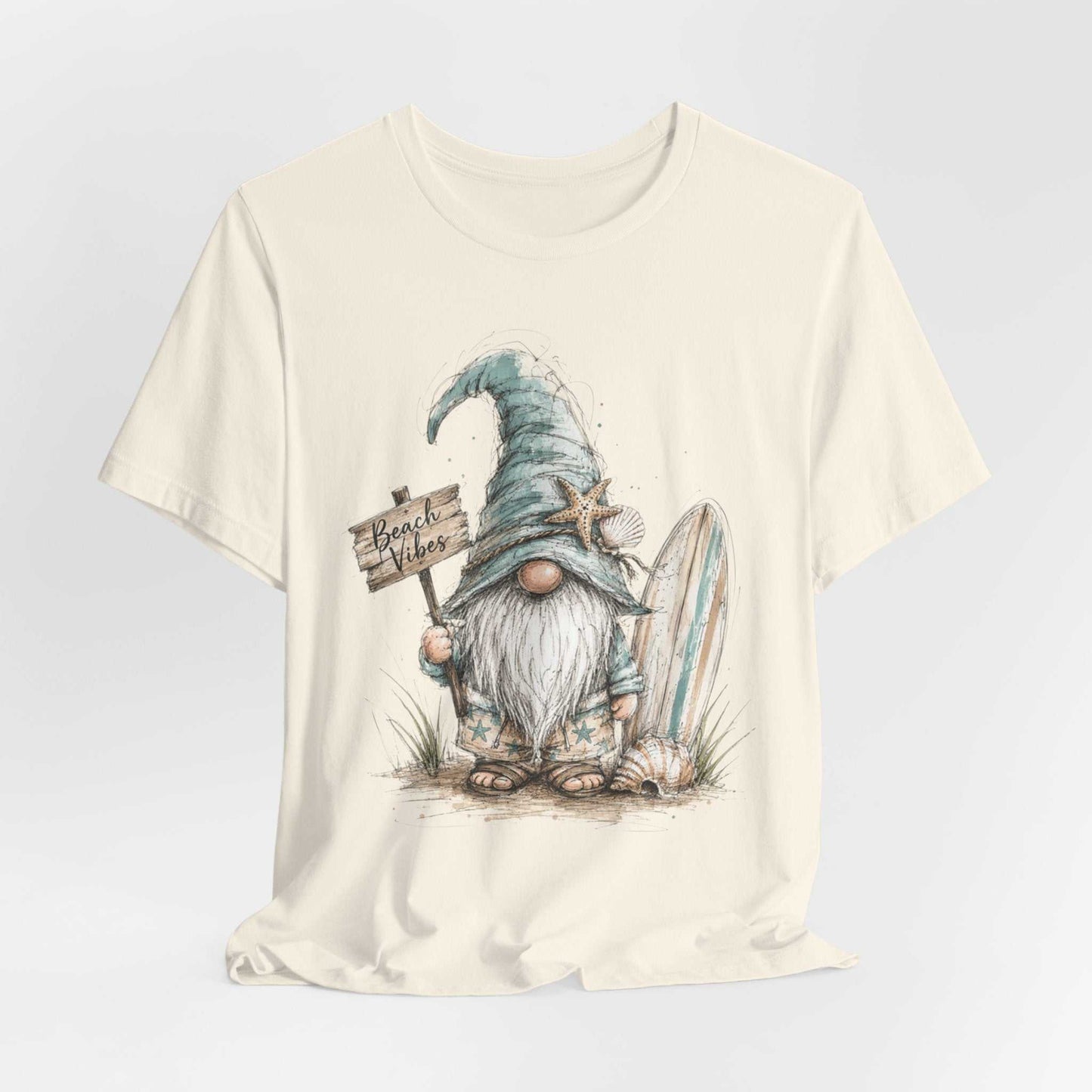 Beach Gnome Shirt with whimsical coastal gnome and seashell graphic on soft lightweight tee