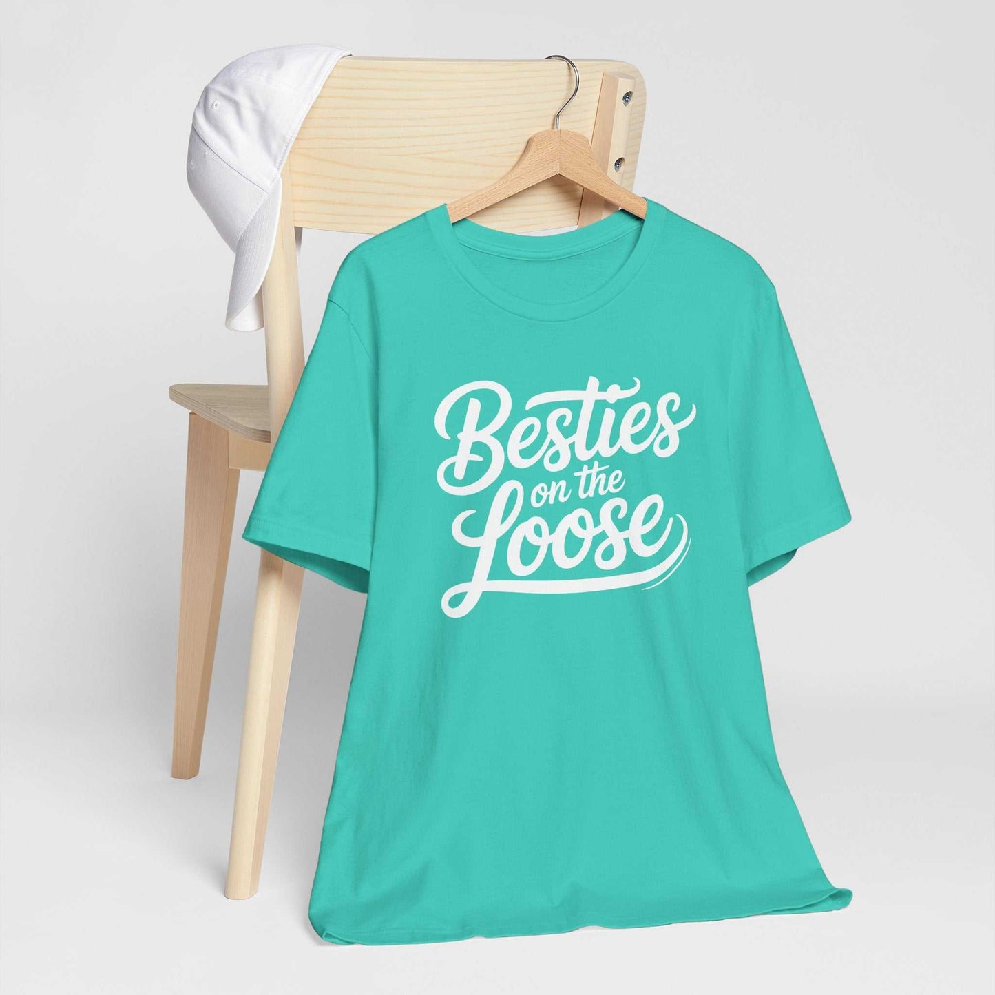 Women wearing Besties on the Loose Tee, a soft Bella Canvas friendship t-shirt perfect for girls' trips and weekend getaways