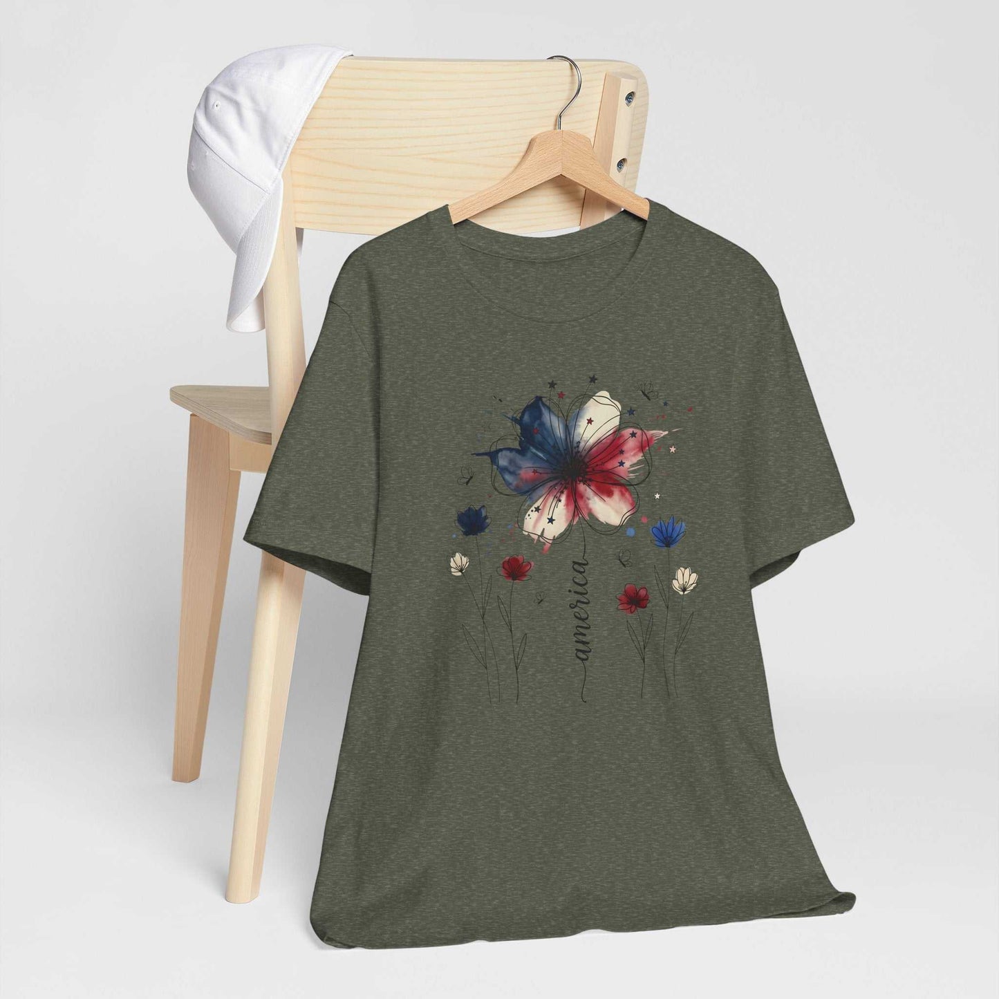 God Bless America Patriotic Floral Tee with red white blue watercolor florals and stars on soft Bella Canvas shirt