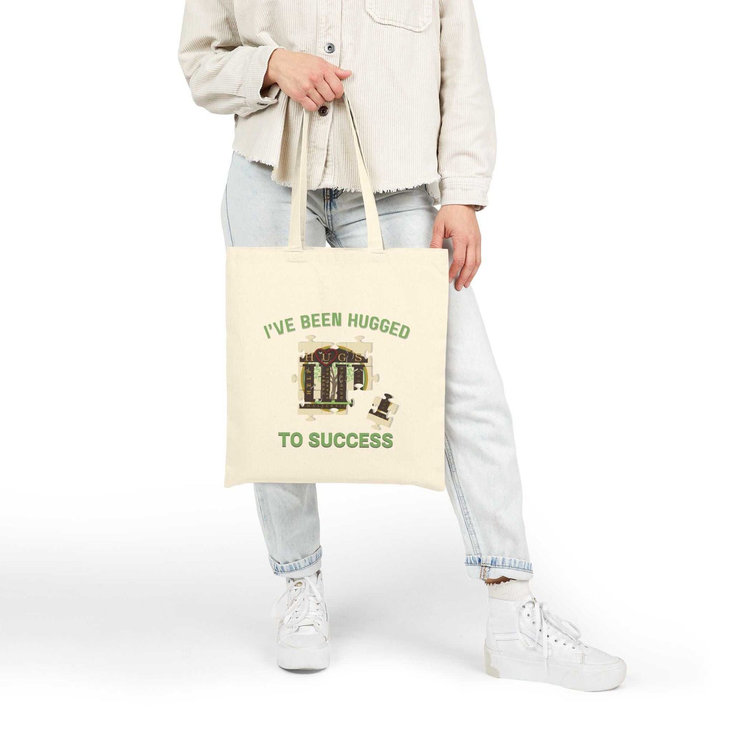 Natural cotton canvas tote bag with "I've Been Hugged to Success" print, durable and lightweight graduation gift tote bag