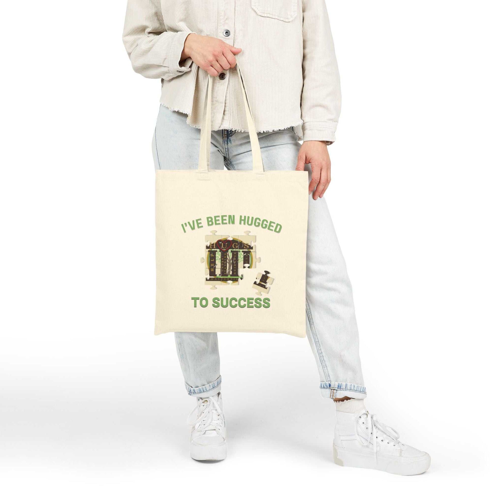 Natural cotton canvas tote bag with "I've Been Hugged to Success" print, durable and lightweight graduation gift tote bag