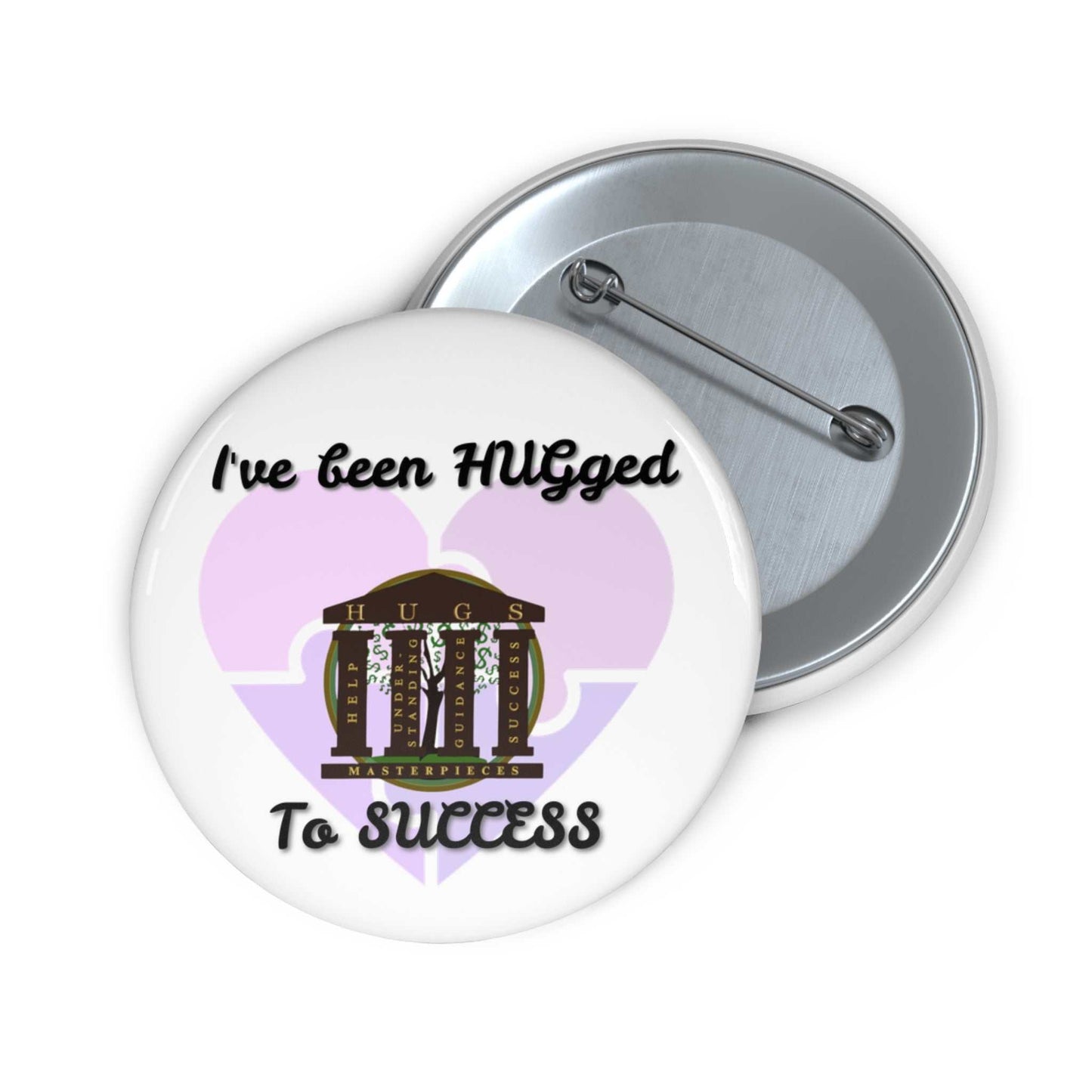 Glossy full-color button pin with "I've Been HUGged to Success" text and steel safety-pin backing