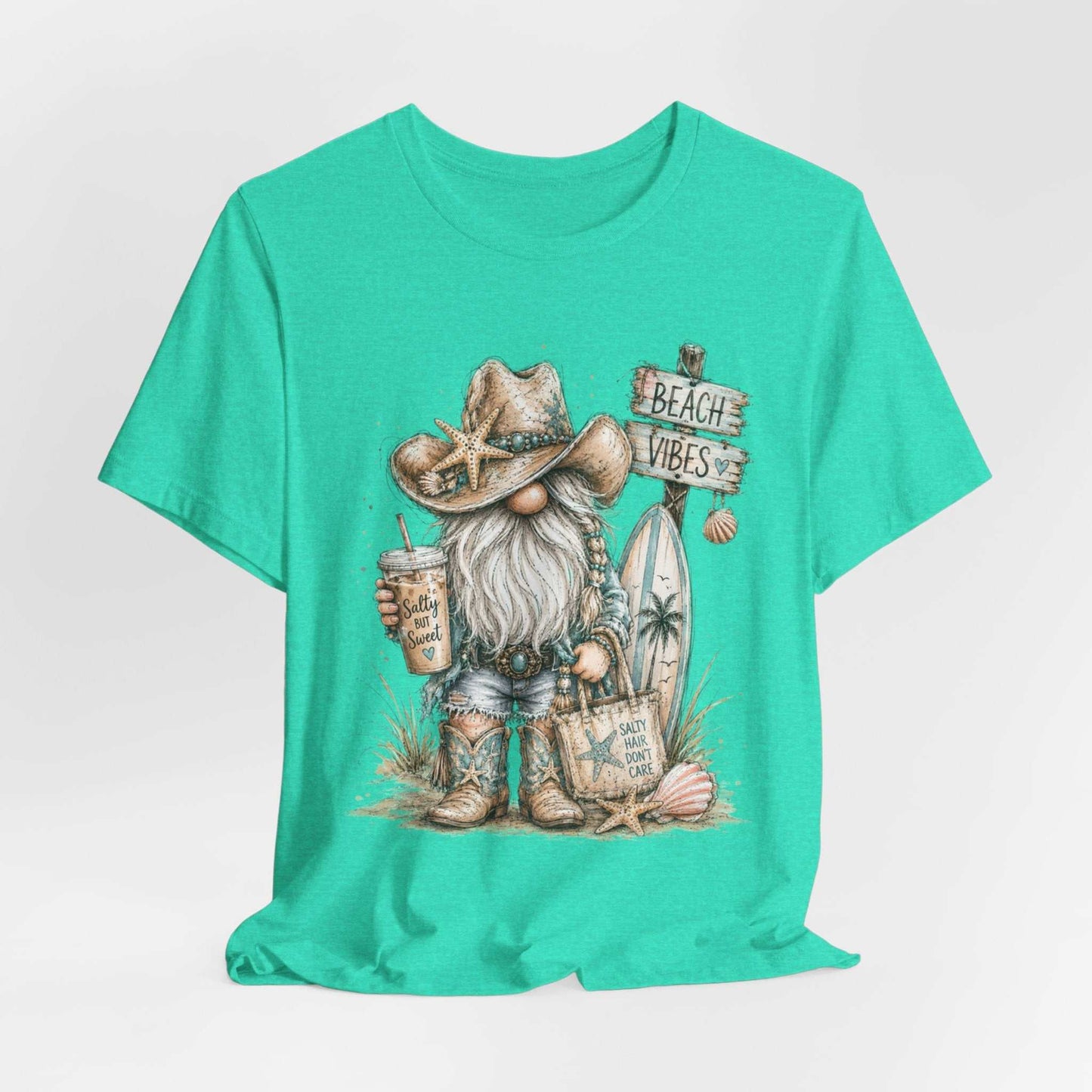 Coastal Cowgirl Beach Gnome t-shirt with turquoise accents, cowboy boots, seashells, and watercolor sketch design for summer beach lovers