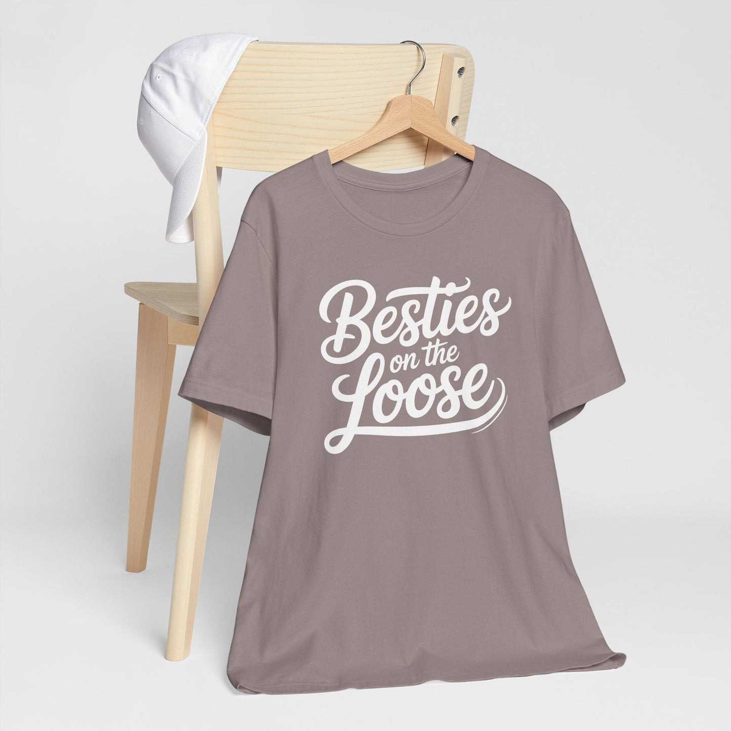 Besties on the Loose Tee featuring a funny BFF friendship design on a soft Bella Canvas 3001 unisex t-shirt perfect for girls' trips and friendship celebrations