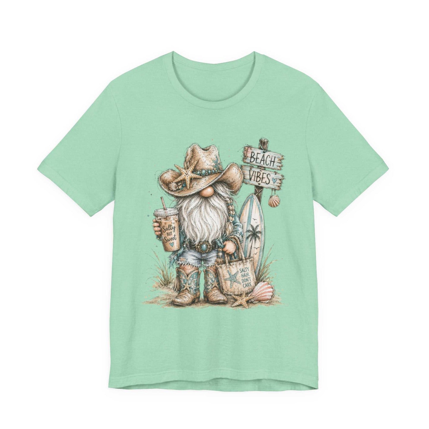 Coastal Cowgirl Beach Gnome t-shirt with turquoise accents, cowboy boots, seashells, and watercolor beach design