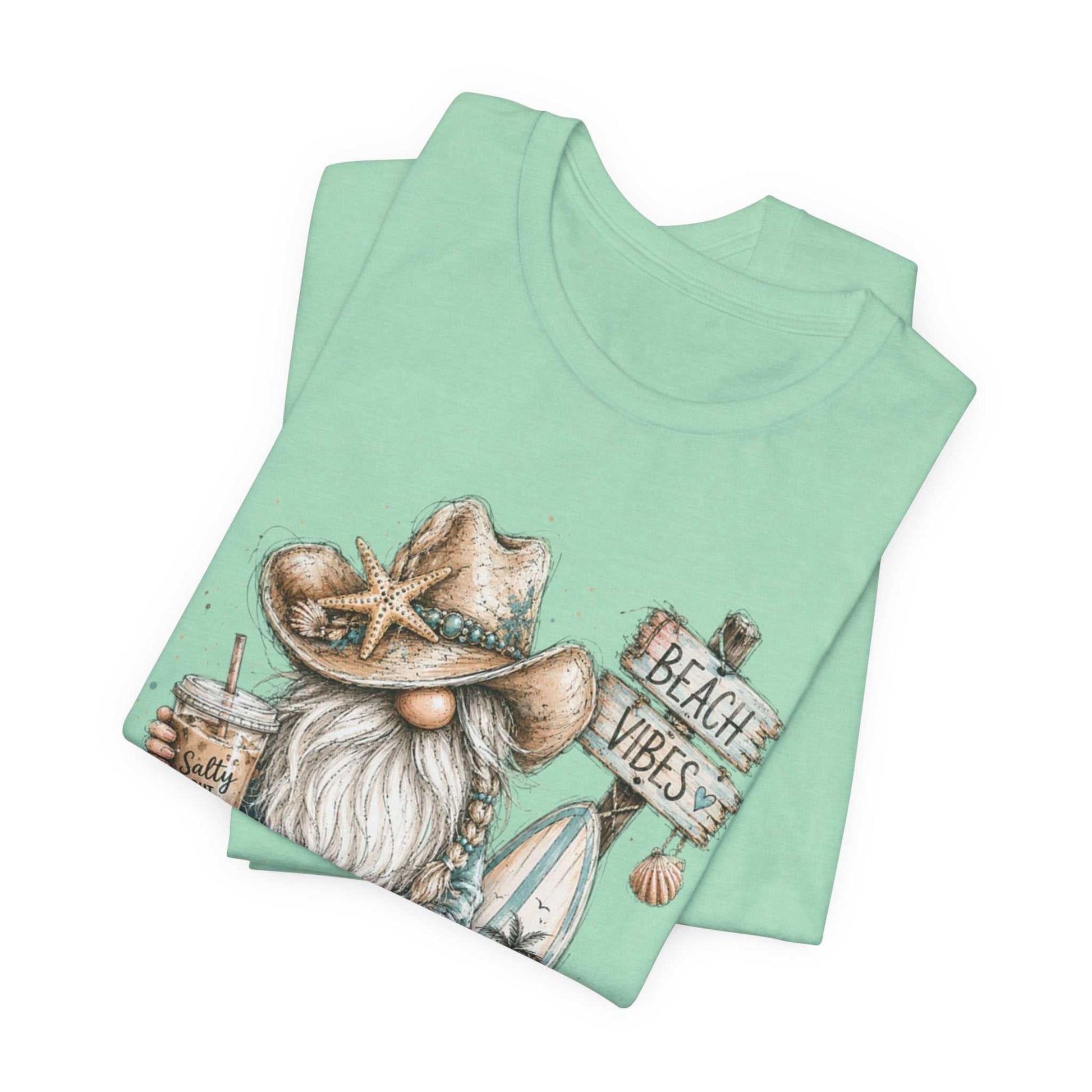 Coastal Cowgirl Beach Gnome summer tee with turquoise, cowboy boots, seashells, and watercolor sketch design
