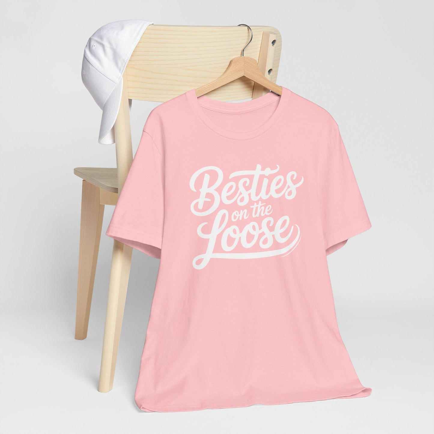 Women wearing Besties on the Loose Tee, a soft Bella Canvas friendship t-shirt for girls' trips and best friend gifts