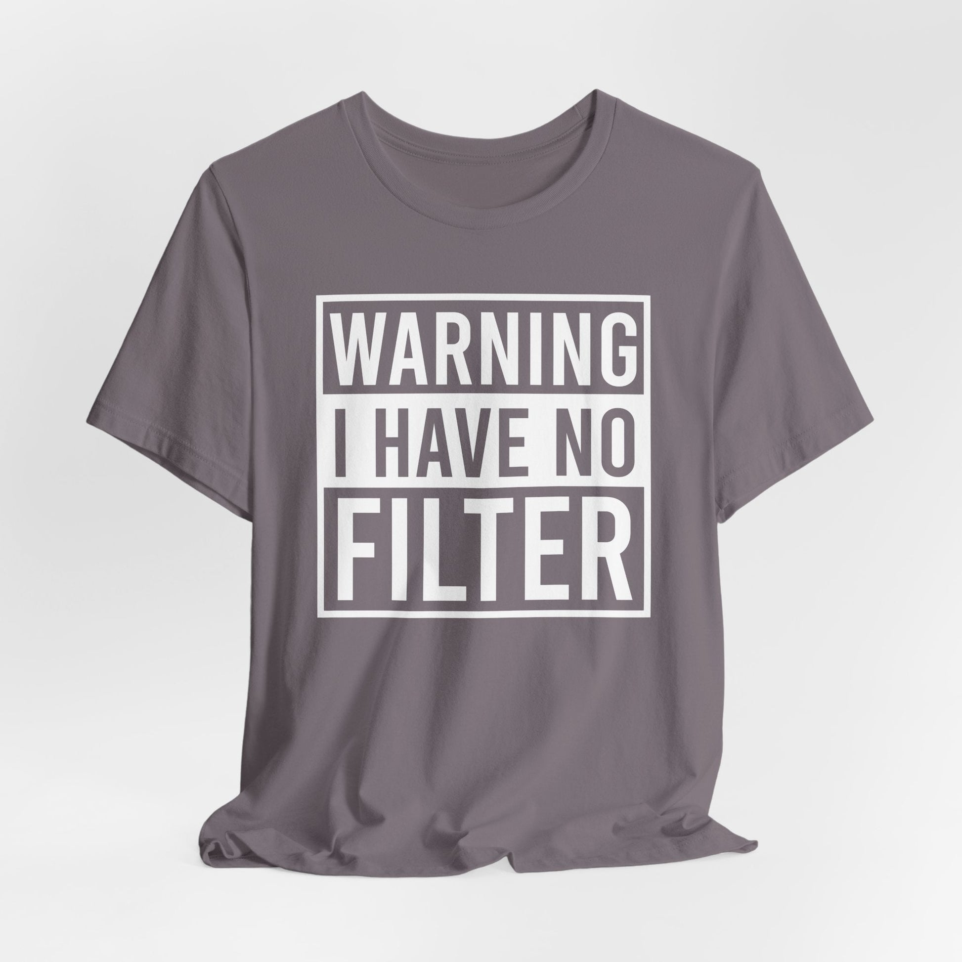Woman wearing a black Bella Canvas 3001 unisex tee with "Warning I Have No Filter" printed in white text