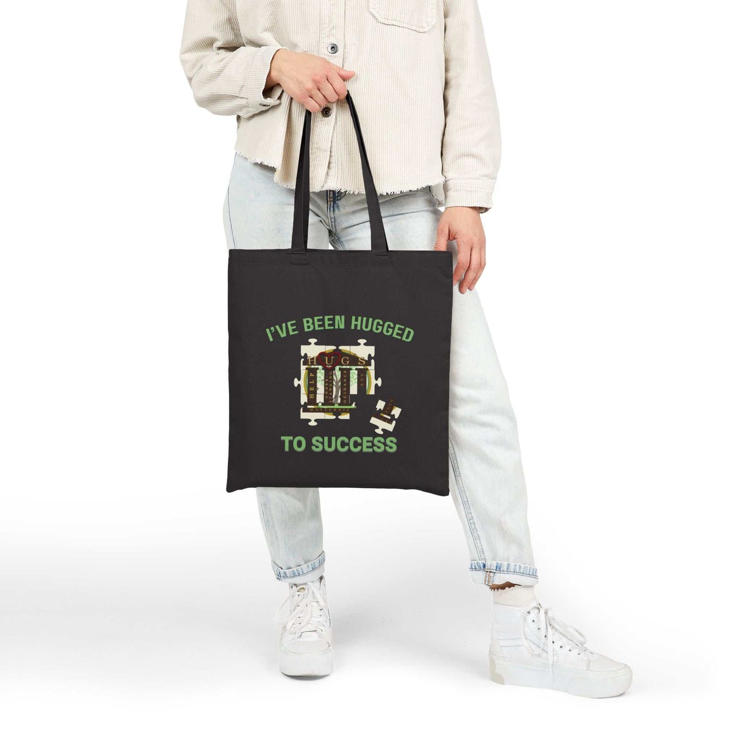 Natural cotton canvas tote bag with "I've Been Hugged to Success" print, durable and lightweight graduation gift