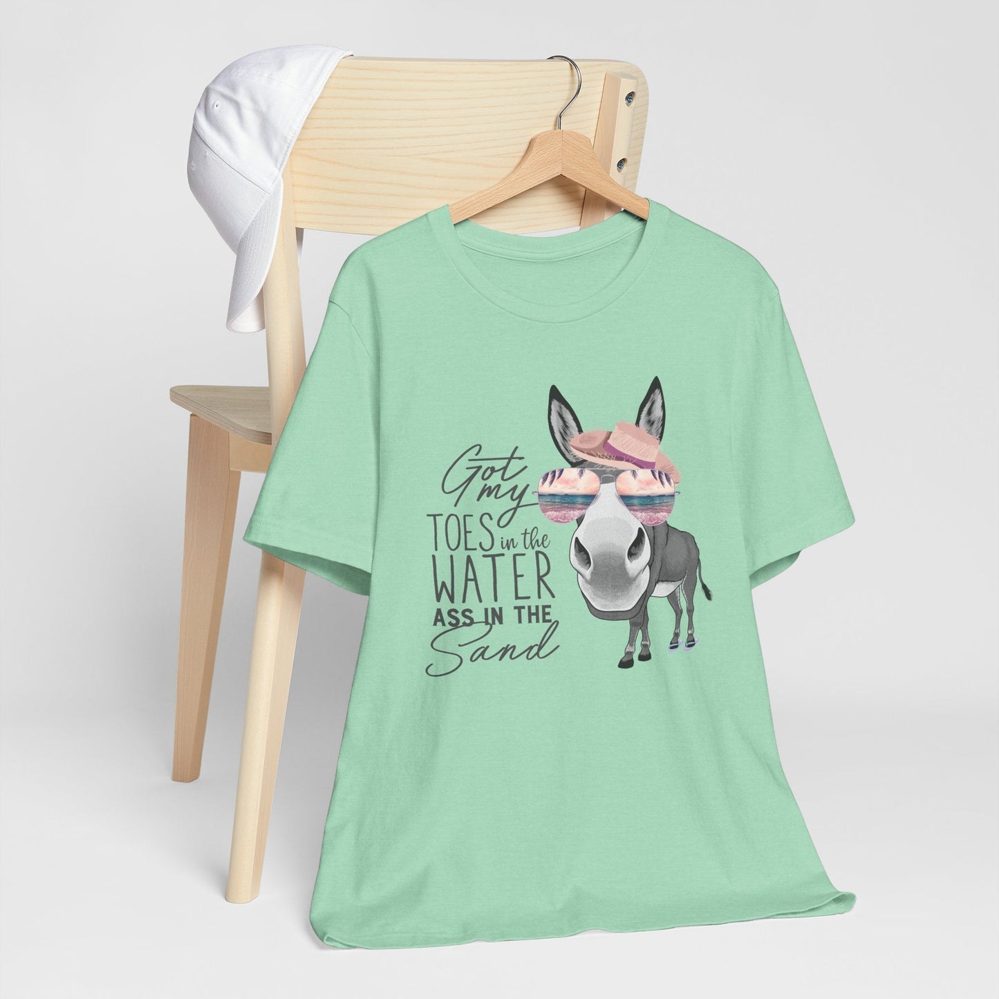 Got My Toes in the Water beach donkey tee with sunglasses, flip-flops, and sun hat on Bella Canvas 3001 shirt