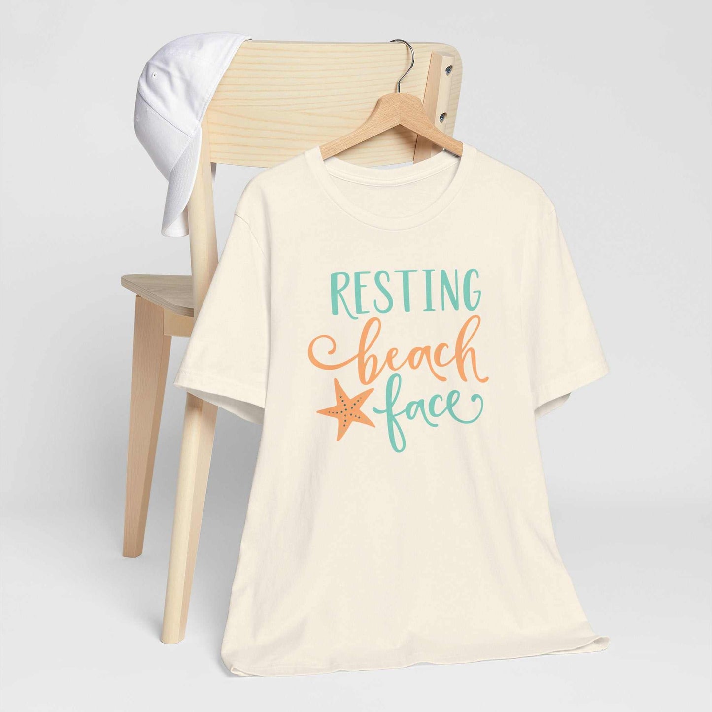Resting Beach Face graphic tee with coastal colors on unisex Bella + Canvas 3001 shirt
