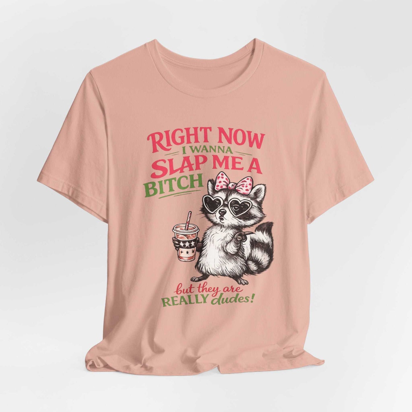 Funny raccoon graphic tee with "Right Now I Wanna Slap Me a BITCH" bold pink and sage lettering
