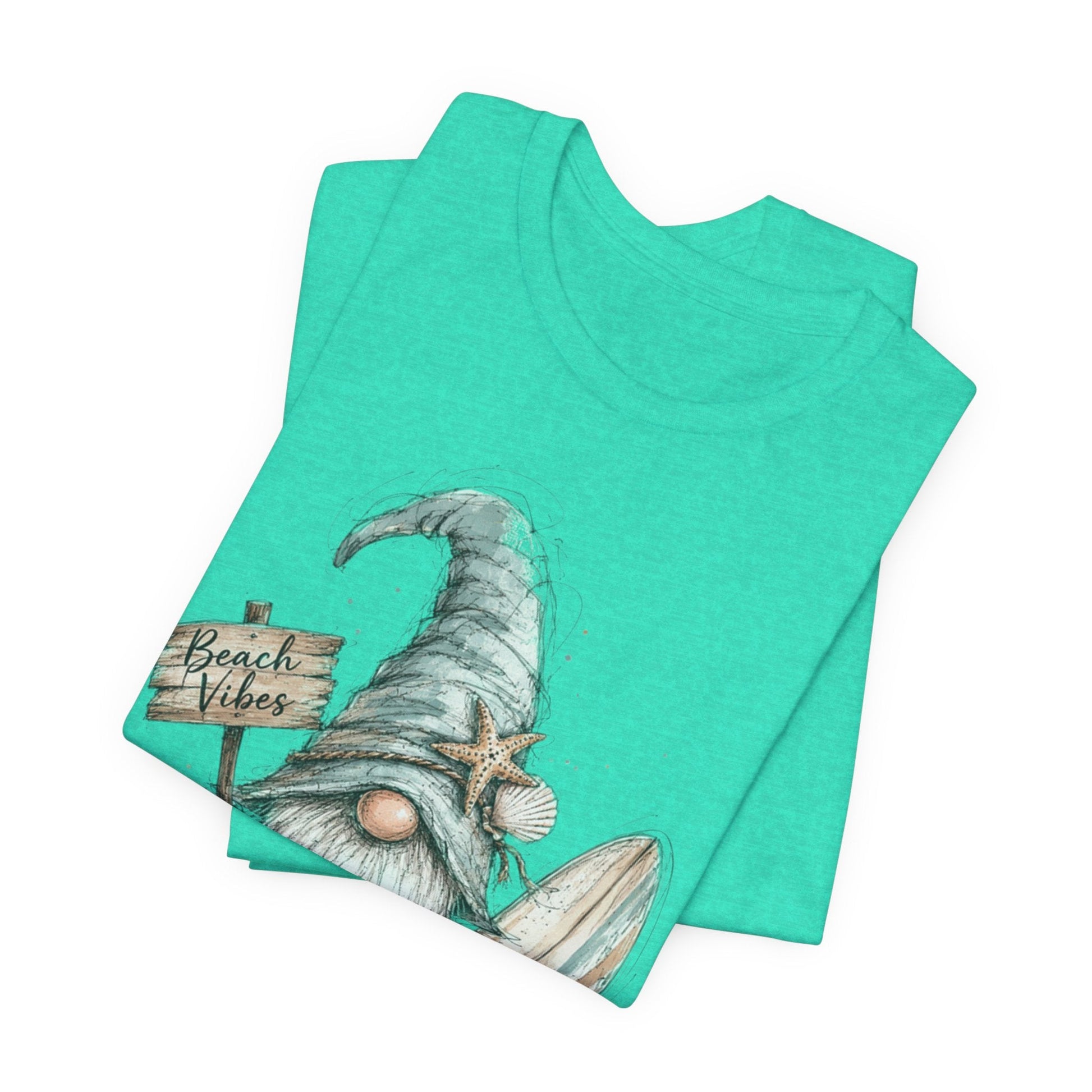 Beach Gnome Shirt with whimsical coastal gnome graphic and seashell accents on a soft unisex tee