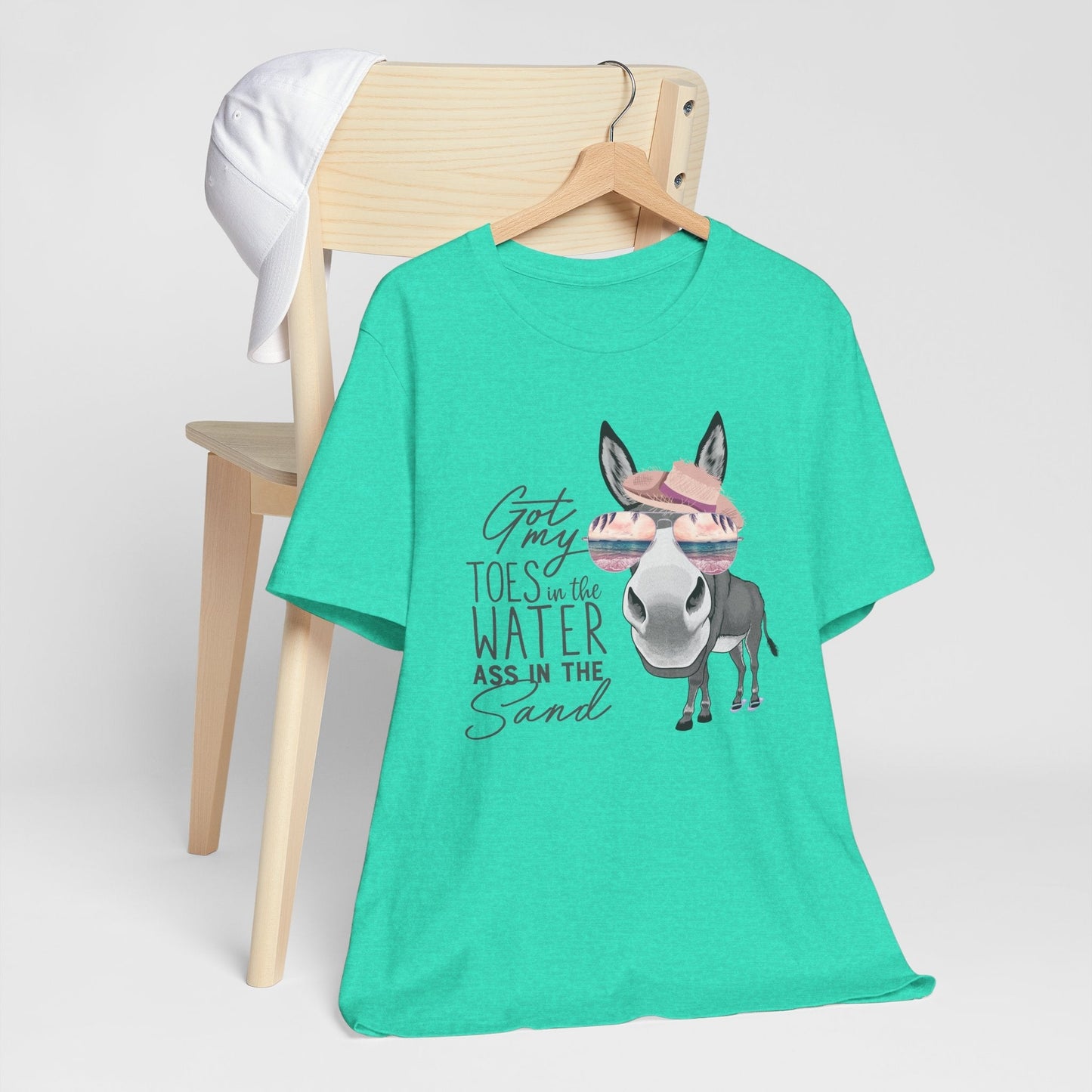 Got My Toes in the Water Beach Donkey T-shirt with donkey wearing sunglasses, hat, and flip-flops on soft Bella Canvas tee