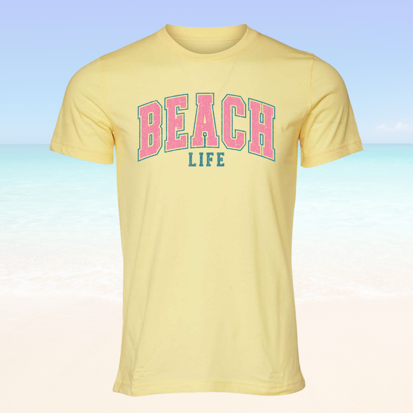 Beach Life Vibe Tee with beach backdrop, unisex fashion.