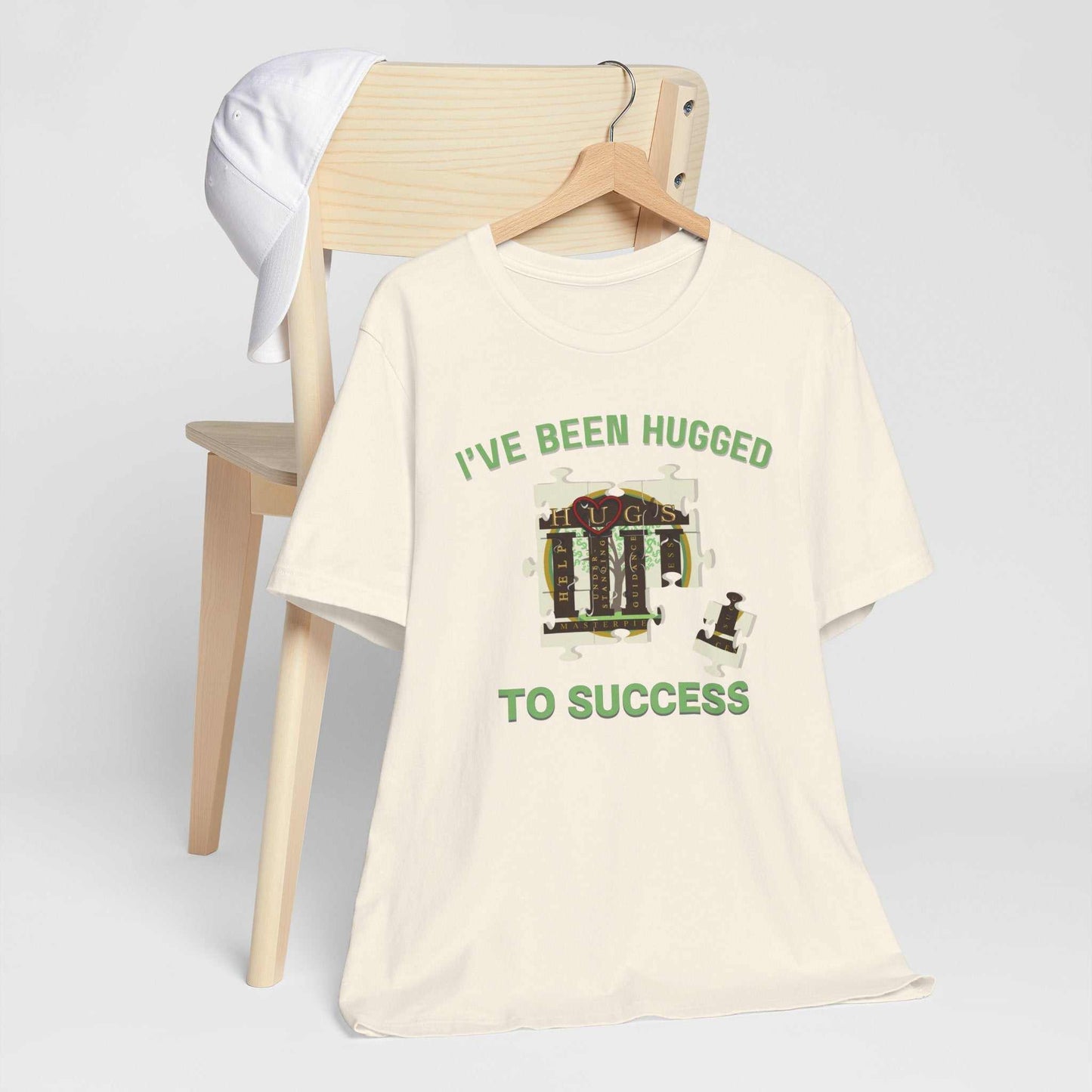 Front view of I've Been Hugged to Success tee with vintage mech illustration on soft cotton fabric