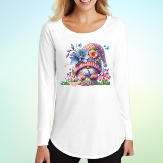 Woman wearing Spring Time Flower Gnome Long Sleeve Shirt with colorful gnome design.