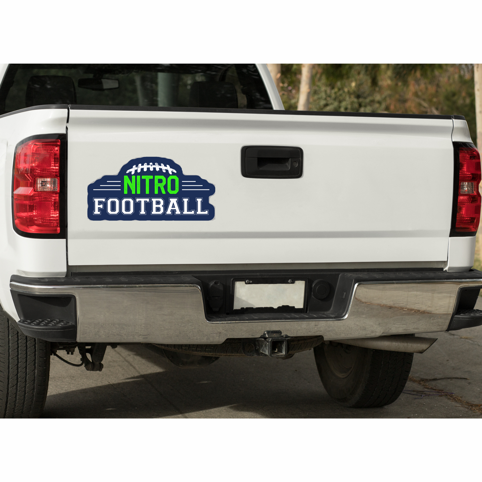 White truck tailgate with Nitro Decals die-cut football decal in blue and green, durable and customizable sticker